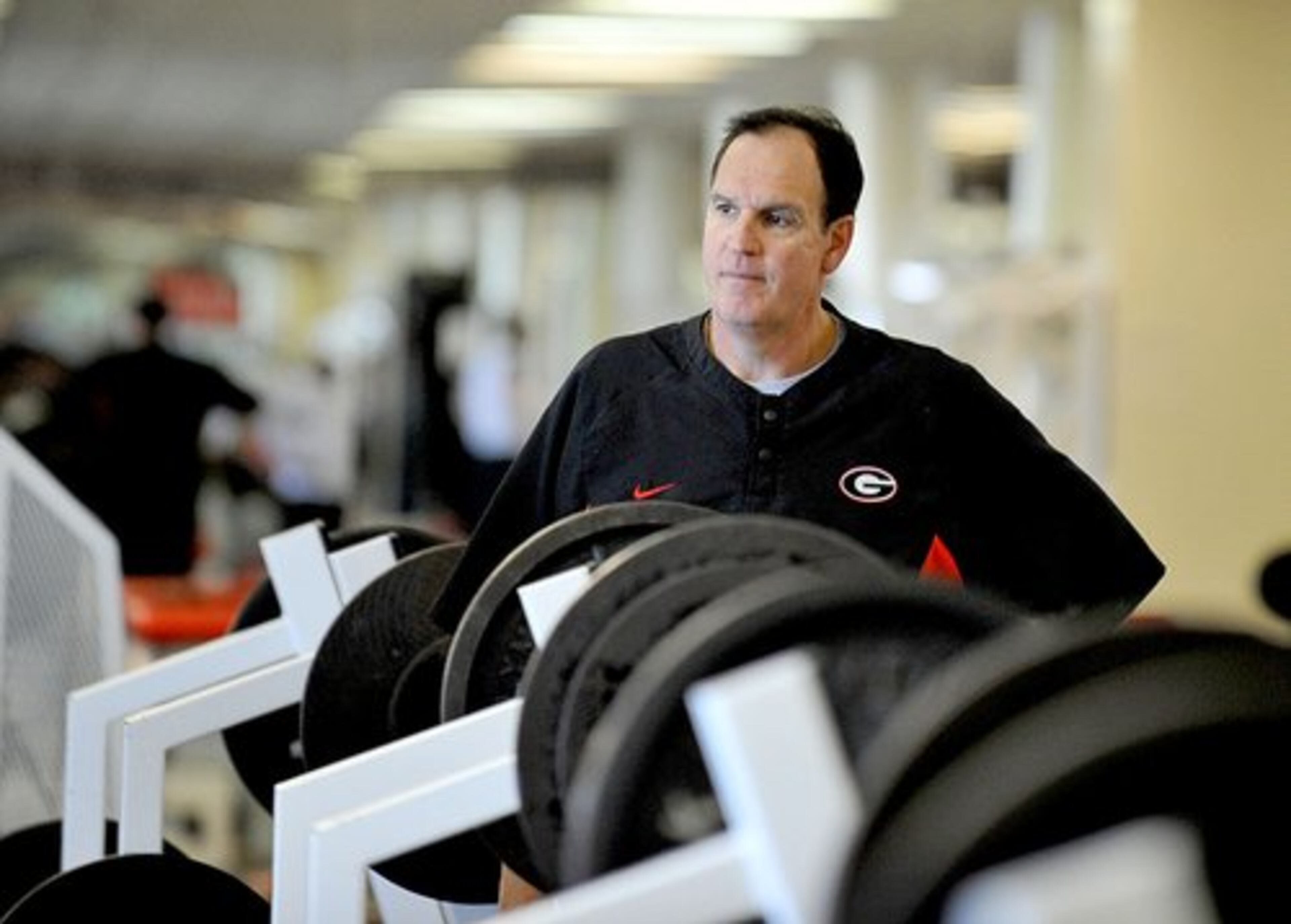 Dave Van Halanger, Georgia's strength and conditioning coach, watches over the players' workouts. Van Halanger has been on Georgia's staff since 2001. He played collegiate football at West Virginia and for the Atlanta Falcons for a season. An injury ended his pro career.
