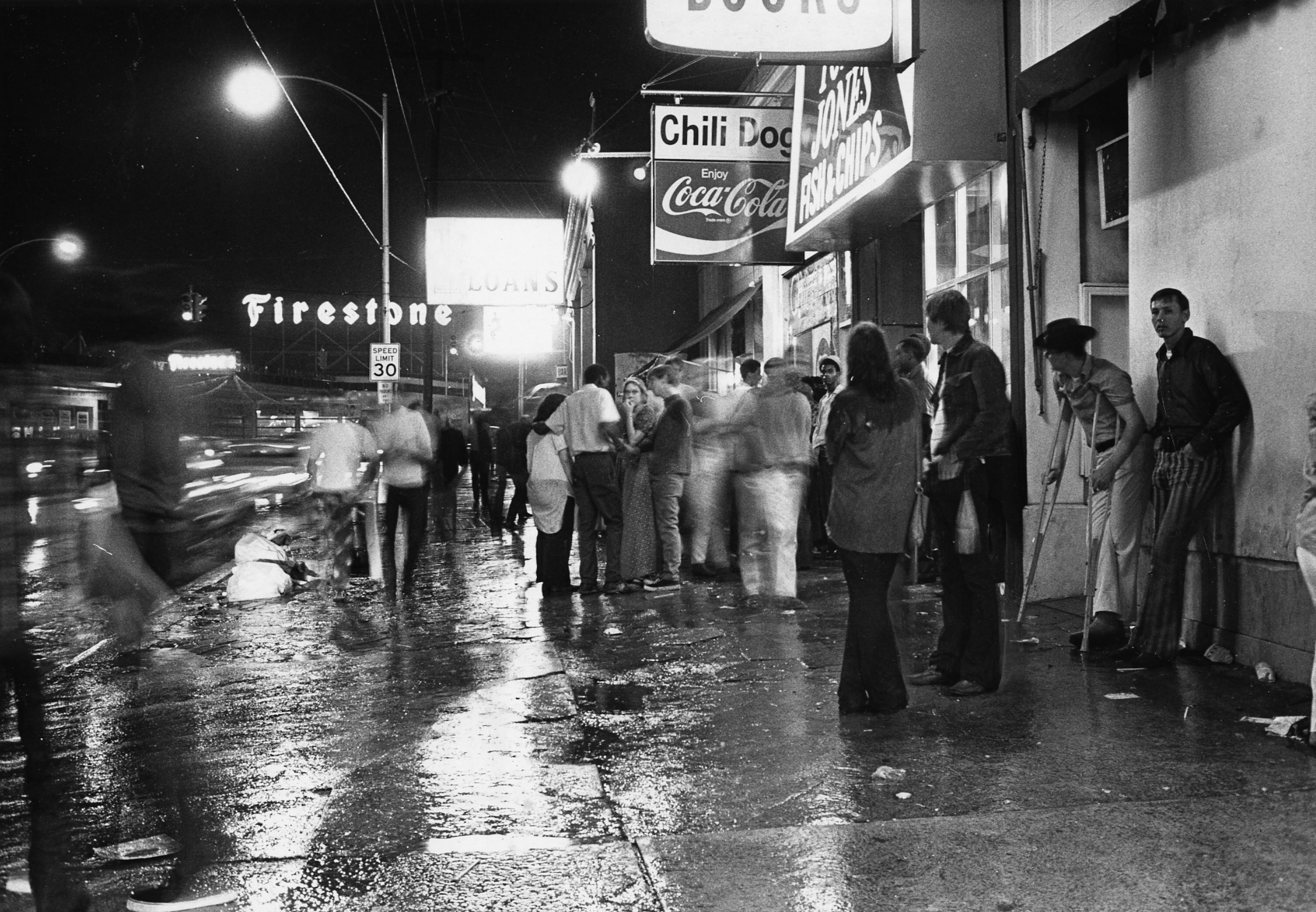 Young street people gather near 10th Street and discourage customers, businessmen contend. (Dwight Ross Jr./AJC staff) 1970