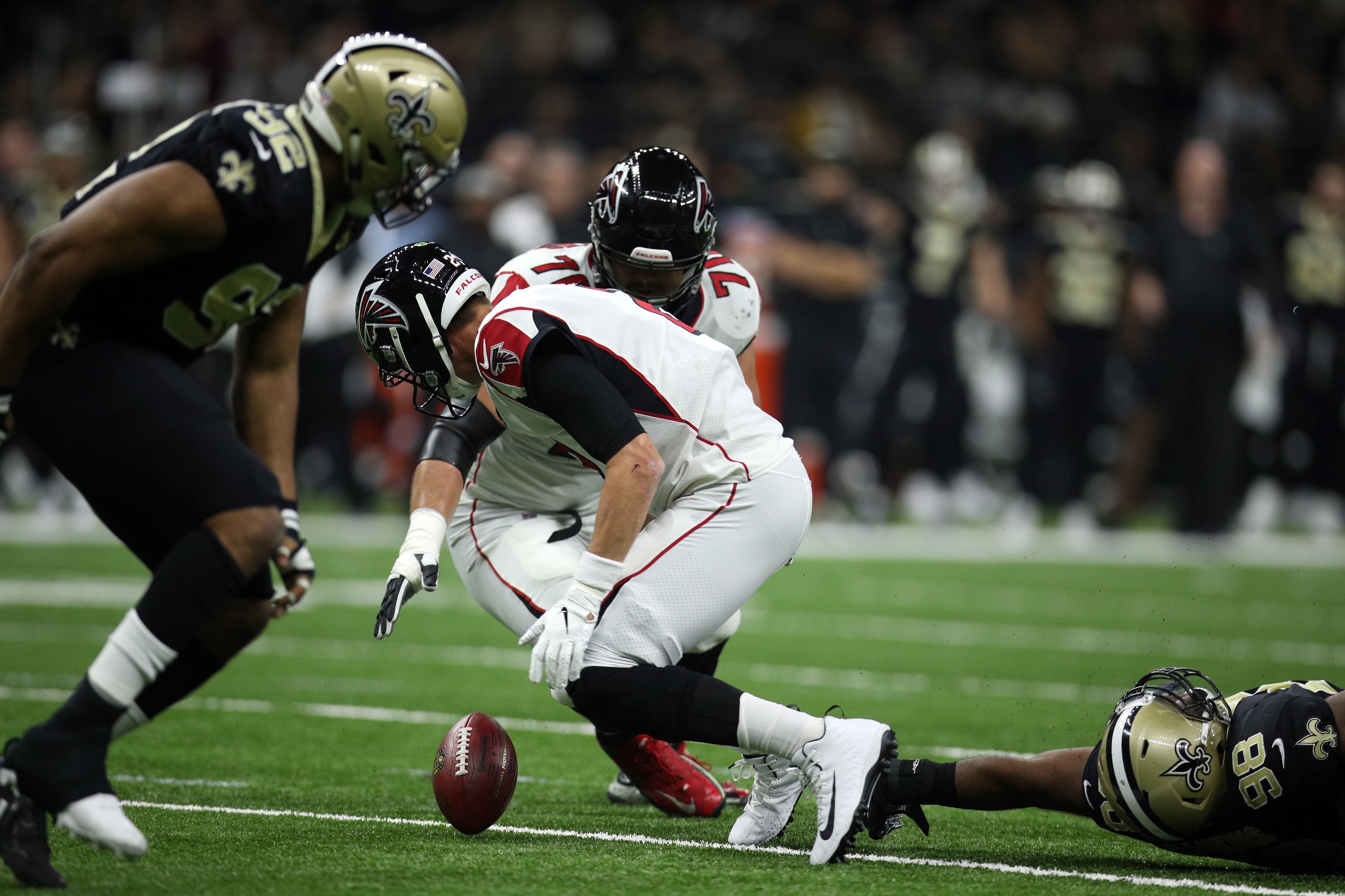 NEW ORLEANS, LA - NOVEMBER 22: Matt Ryan #2 of the Atlanta Falcons fumbles the ball agains the New Orleans Saints at the Mercedes-Benz Superdome on November 22, 2018 in New Orleans, Louisiana. (Photo by Chris Graythen/Getty Images)