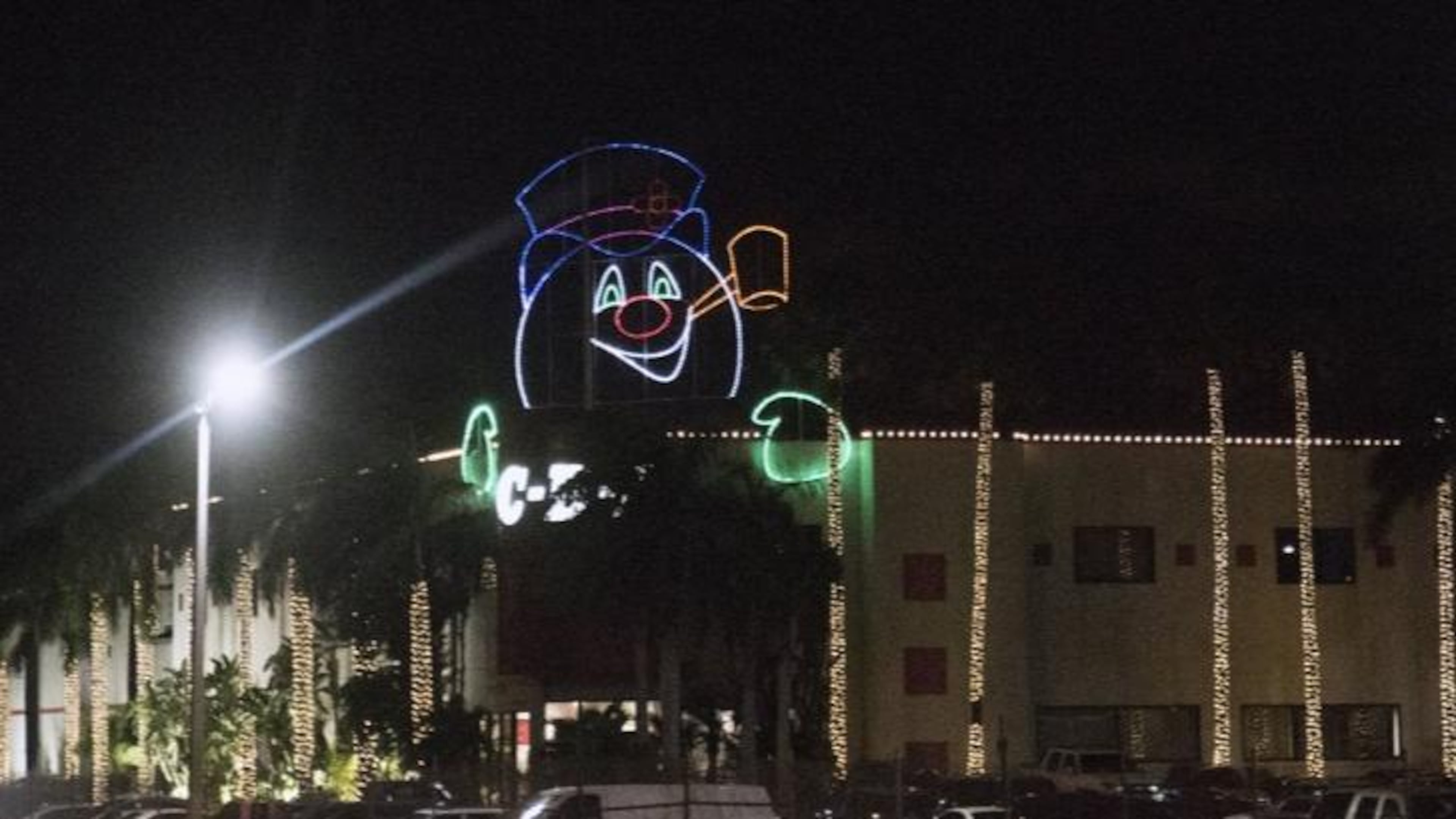 Frosty the Snowman light arrangement on the roof of Cheney Brothers, Inc., in Riviera Beach.