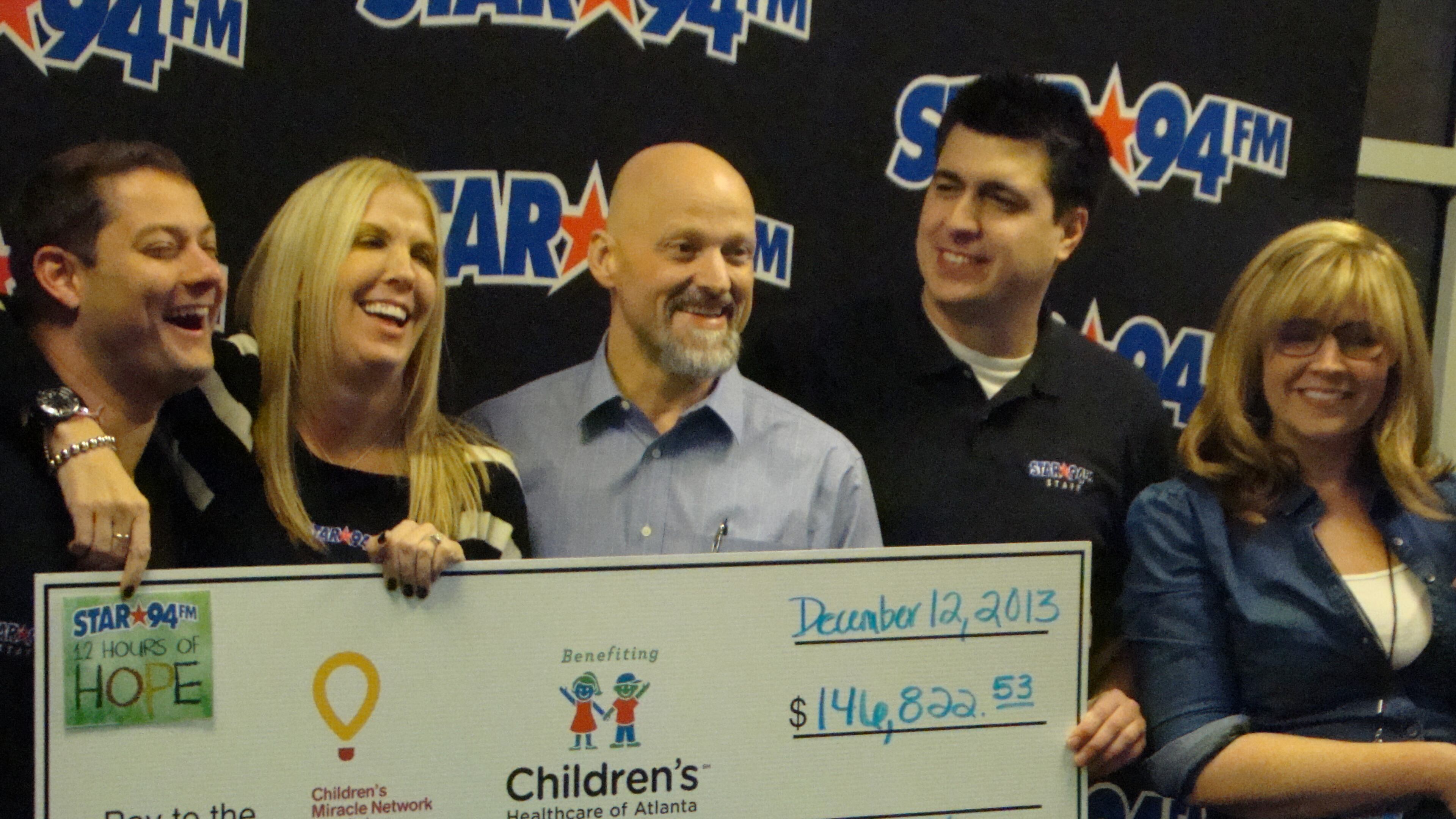 Scott Lindy (center) just left Star 94 after four plus years as program director. CREDIT: Rodney Ho/rho@ajc.com