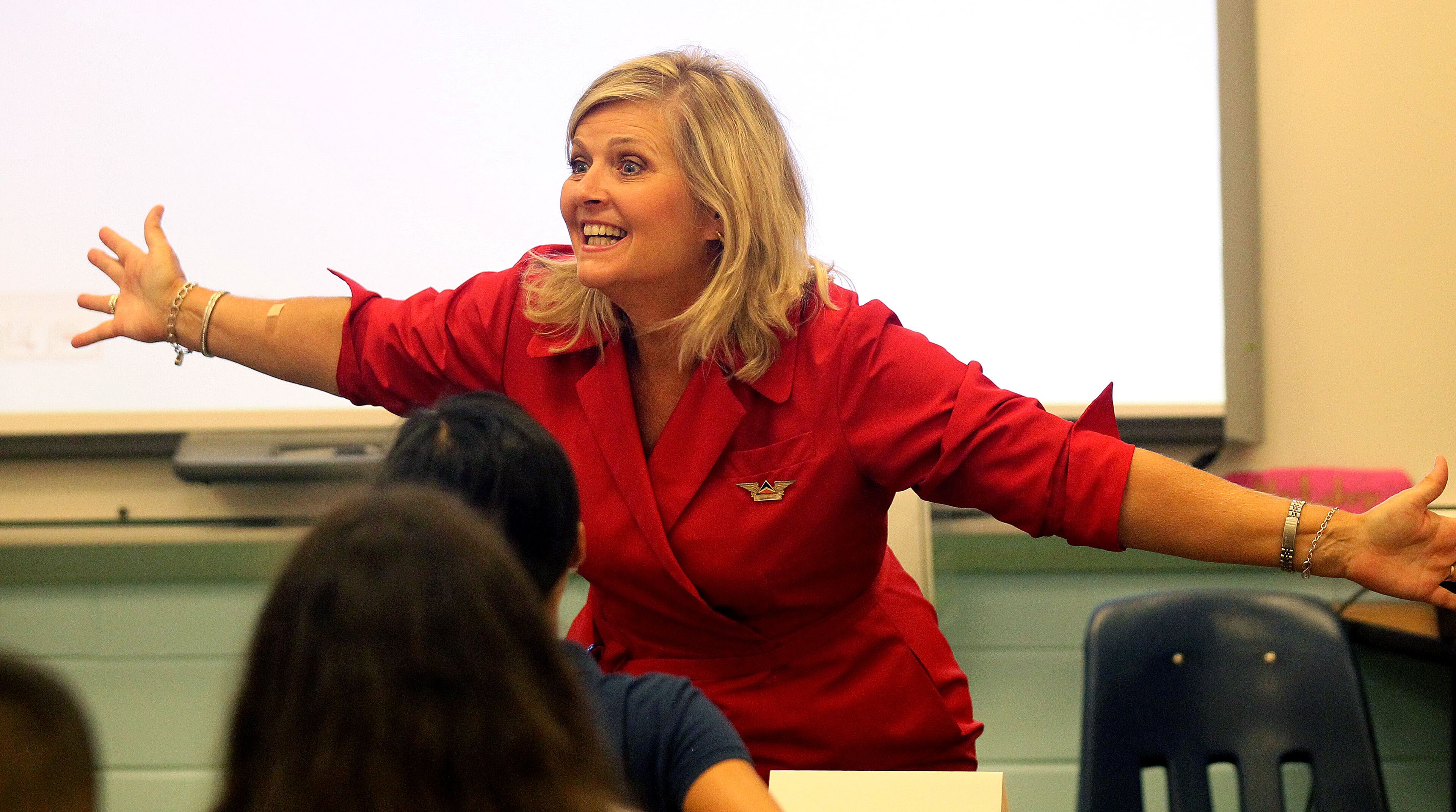 The Cobb Middle School teacher of the year dressed as a flight attendant, handed out boarding passes for the student's assigned desks & served a snack during the "in flight" movie of the topics the class will study this year.