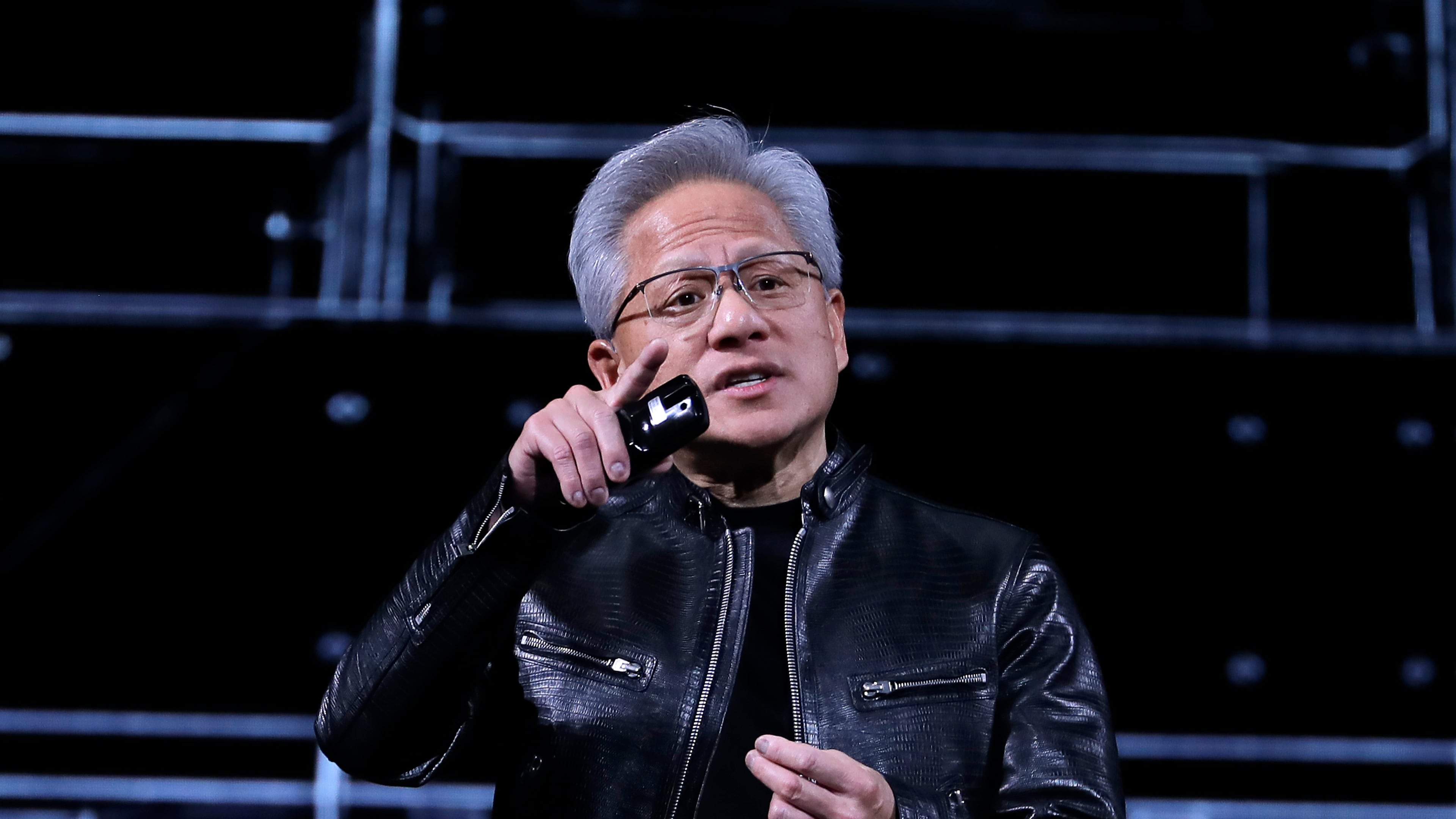 Nvidia CEO Jensen Huang delivers a speech during the Computex 2026 exhibition in Taipei, Taiwan, Monday, June 1, 2026. (AP Photo/Chiang Ying-ying)