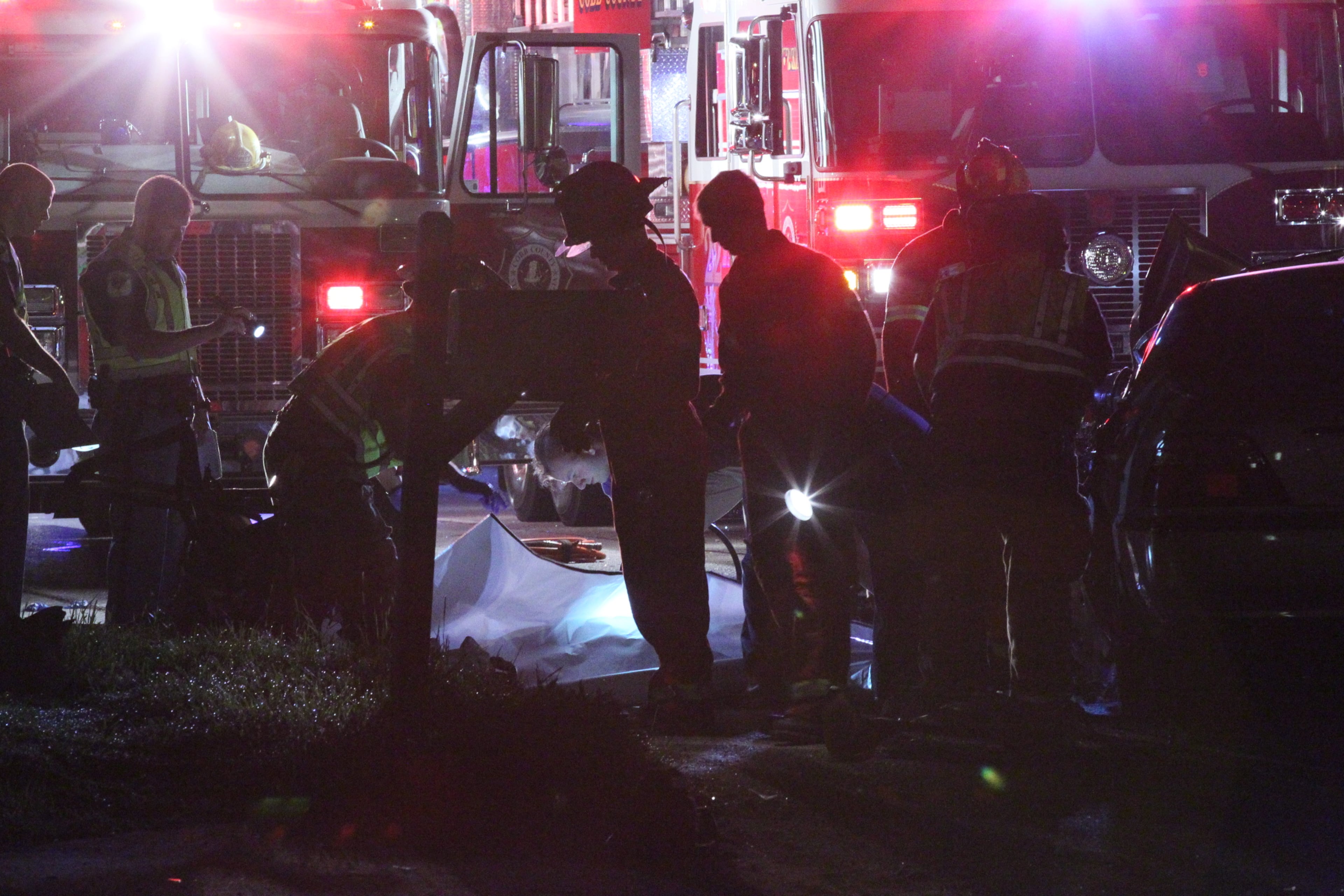 Two people died in the wreck, which happened before 4:30 a.m. in the 5600 block of Austell Road, between Veterans Memorial Highway and Perkerson Mill Road. JOHN SPINK/JSPINK@AJC.COM
