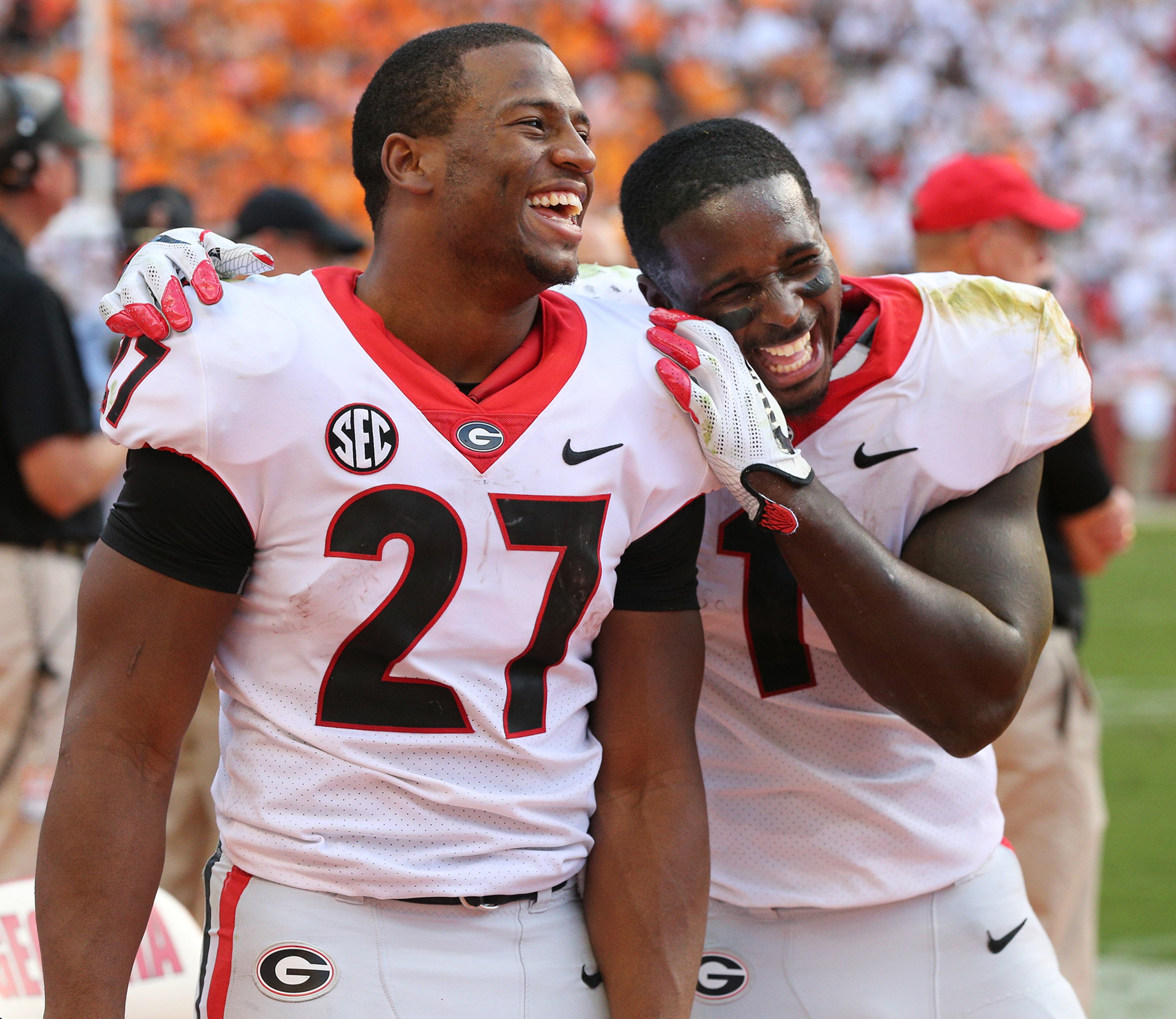 September 30, 2017 Knoxville: Georgia tailbacks Nick Chubb (left) and Sony Michel celebrate on the sidelines during the fourth quarter of a 41-0 shut out over Tennessee in a NCAA college football game on Saturday, September 30, 2017, in Knoxville. Curtis Compton/ccompton@ajc.com