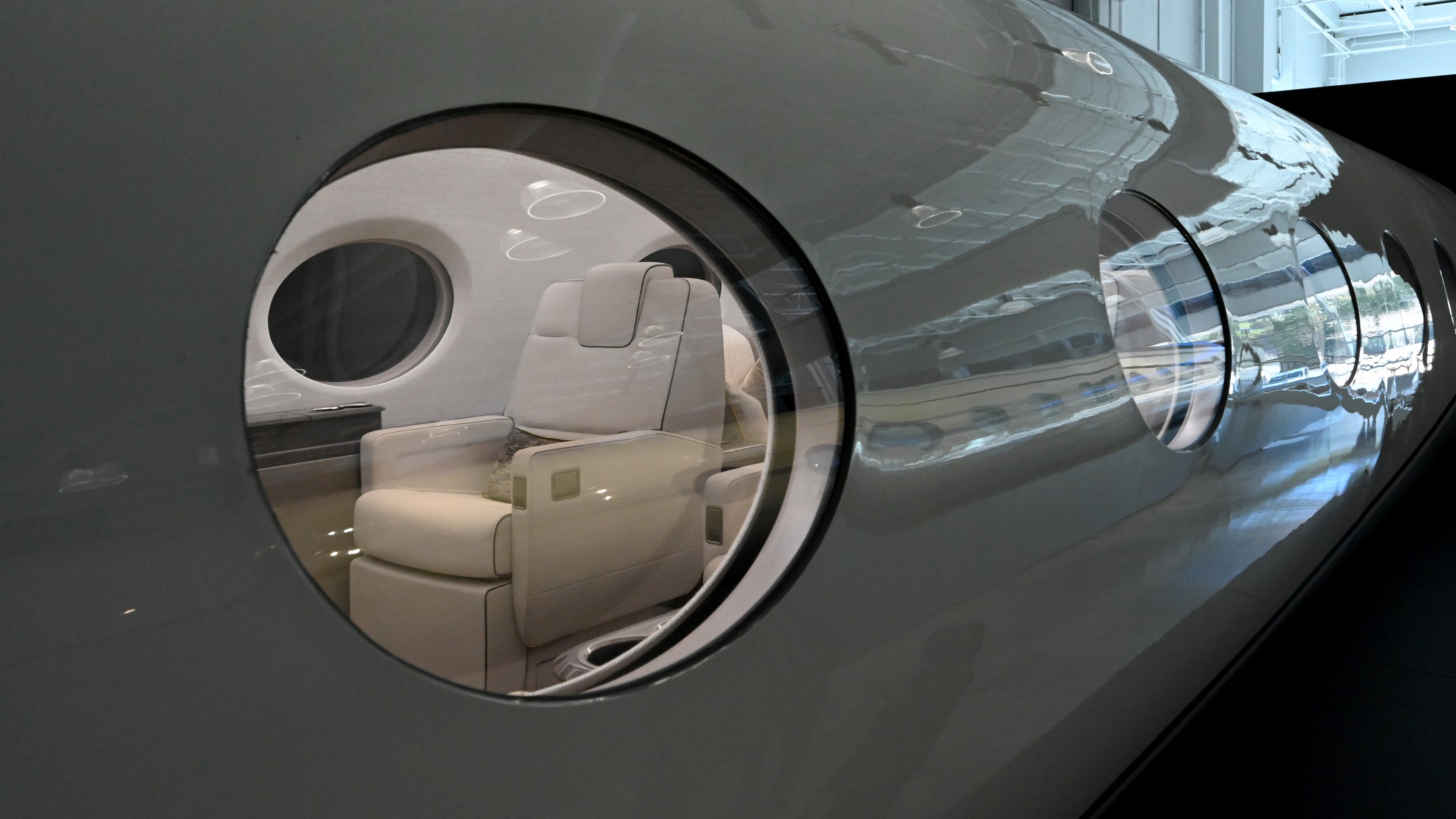 A peek through the window of a Gulfstream G300 aircraft at Gulfstream Aerospace Corporation’s showroom in Savannah on Friday, Dec. 19, 2025. (Hyosub Shin/AJC)