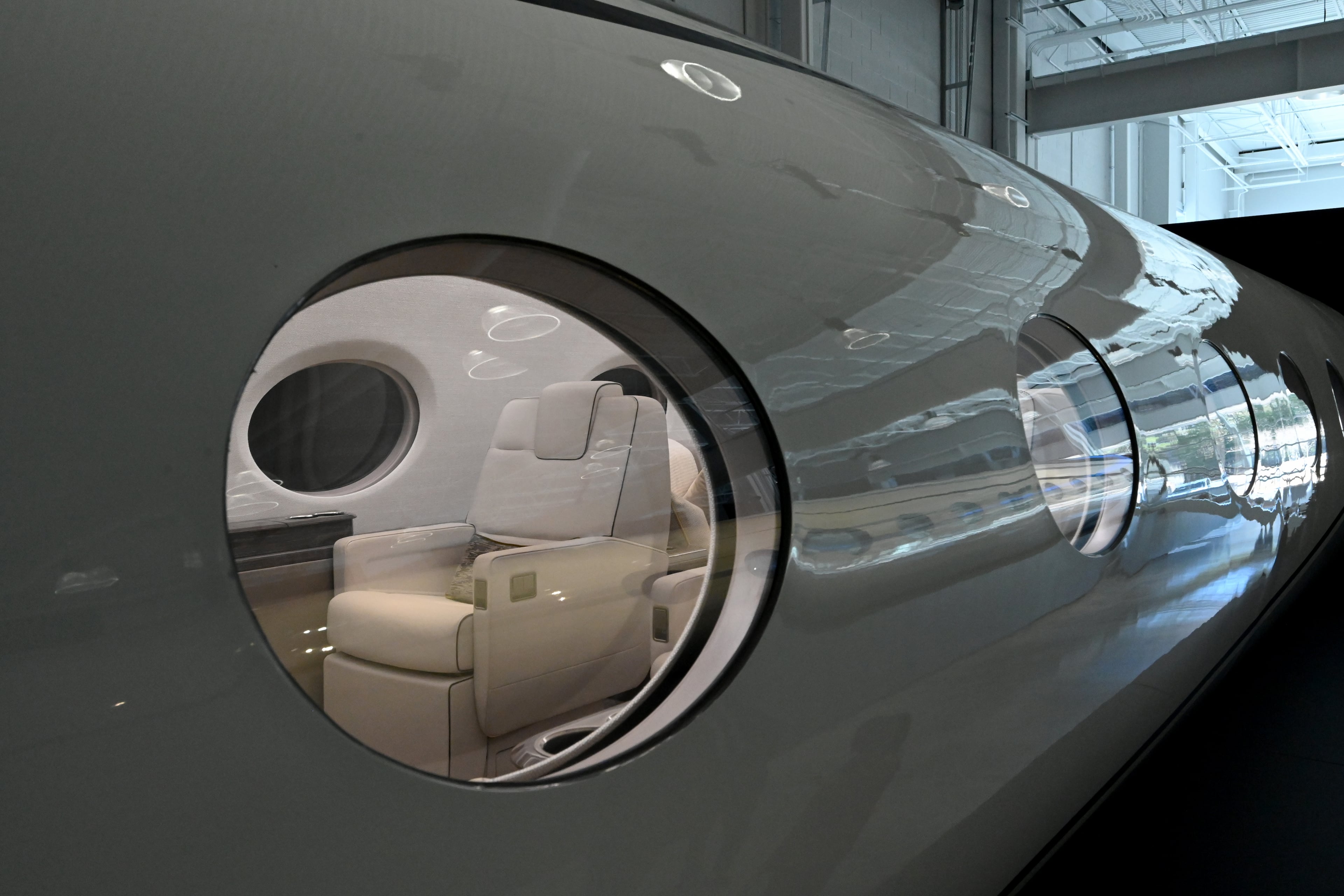A peek through the window of a Gulfstream G300 aircraft at Gulfstream Aerospace Corporation’s showroom in Savannah on Friday, Dec. 19, 2025. (Hyosub Shin/AJC)