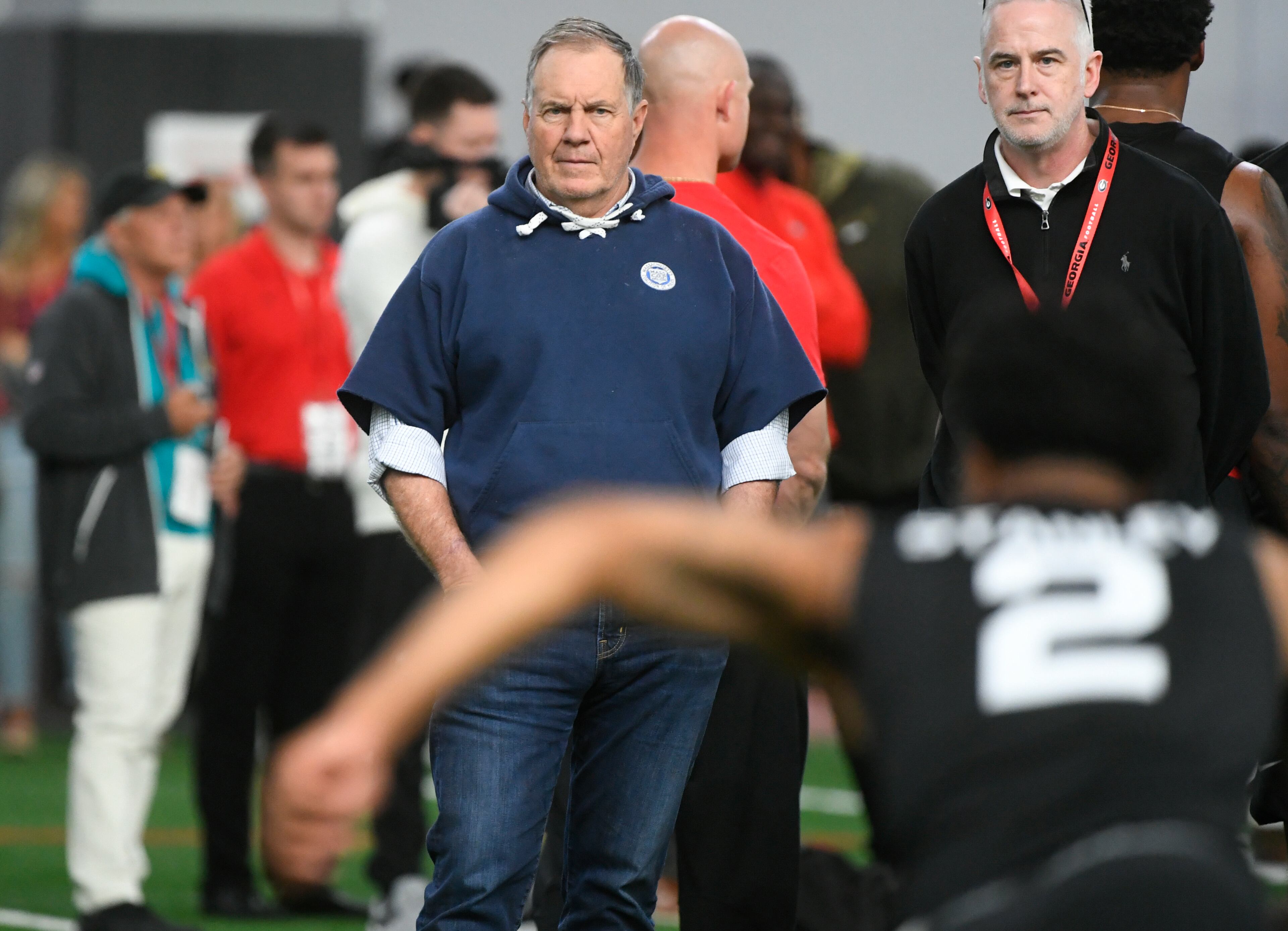 New England Patriots coach Bill Belichick, center, watches Jayson Stanley run a football drill during Georgia's Pro Day, Wednesday in Athens. (AP Photo/John Amis)