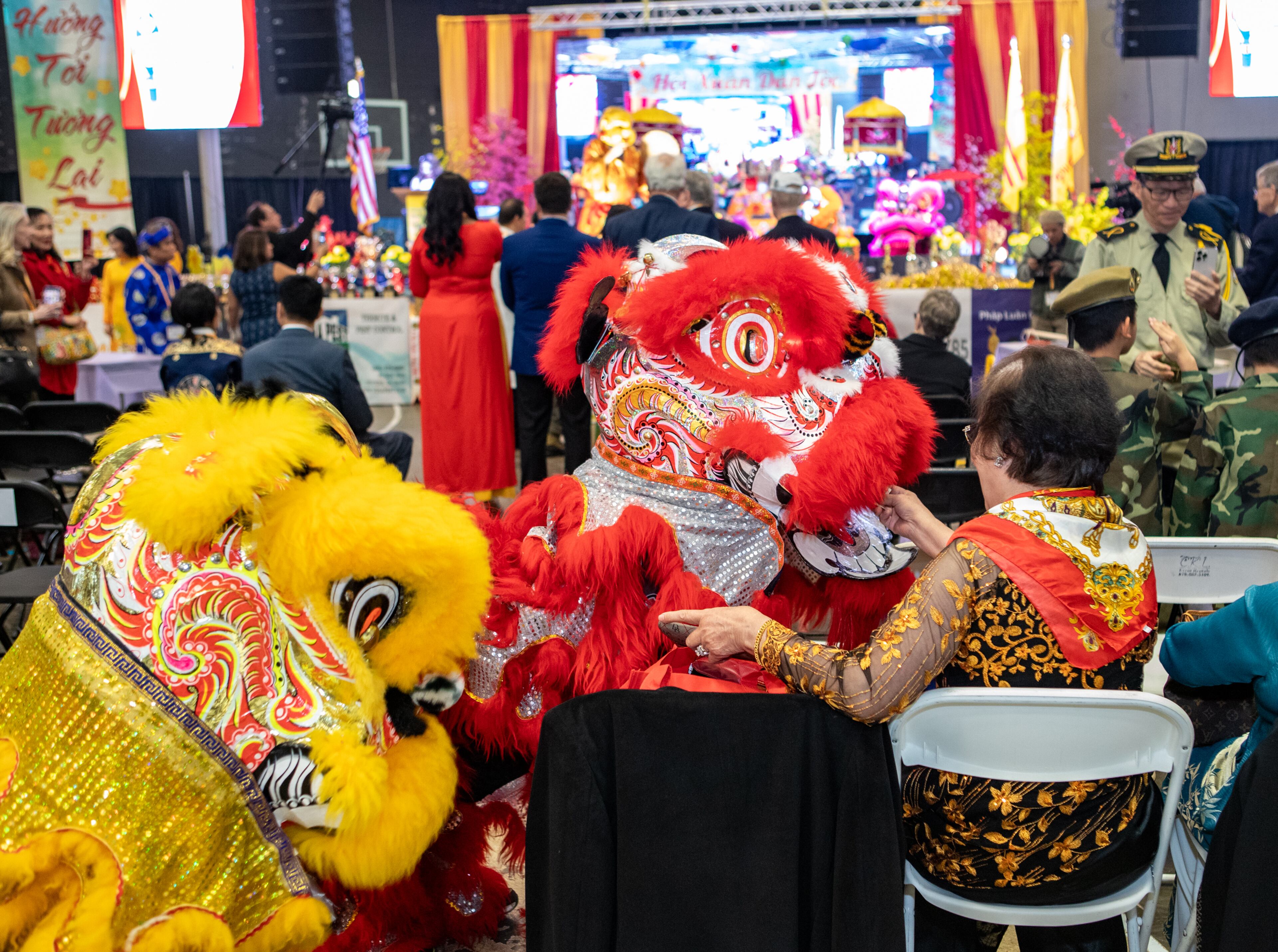 After their performance, the lions approach the audience for lucky money during the Lunar New Year celebration, hosted by The Vietnamese American Community of Georgia at Plaza Las Americas in Lilburn on Saturday, Feb 3, 2024 where dragon and lion dancing begins the weekend. The celebration continues on Sunday and includes traditional food, music and cultural festivities. (Jenni Girtman for The Atlanta Journal-Constitution)