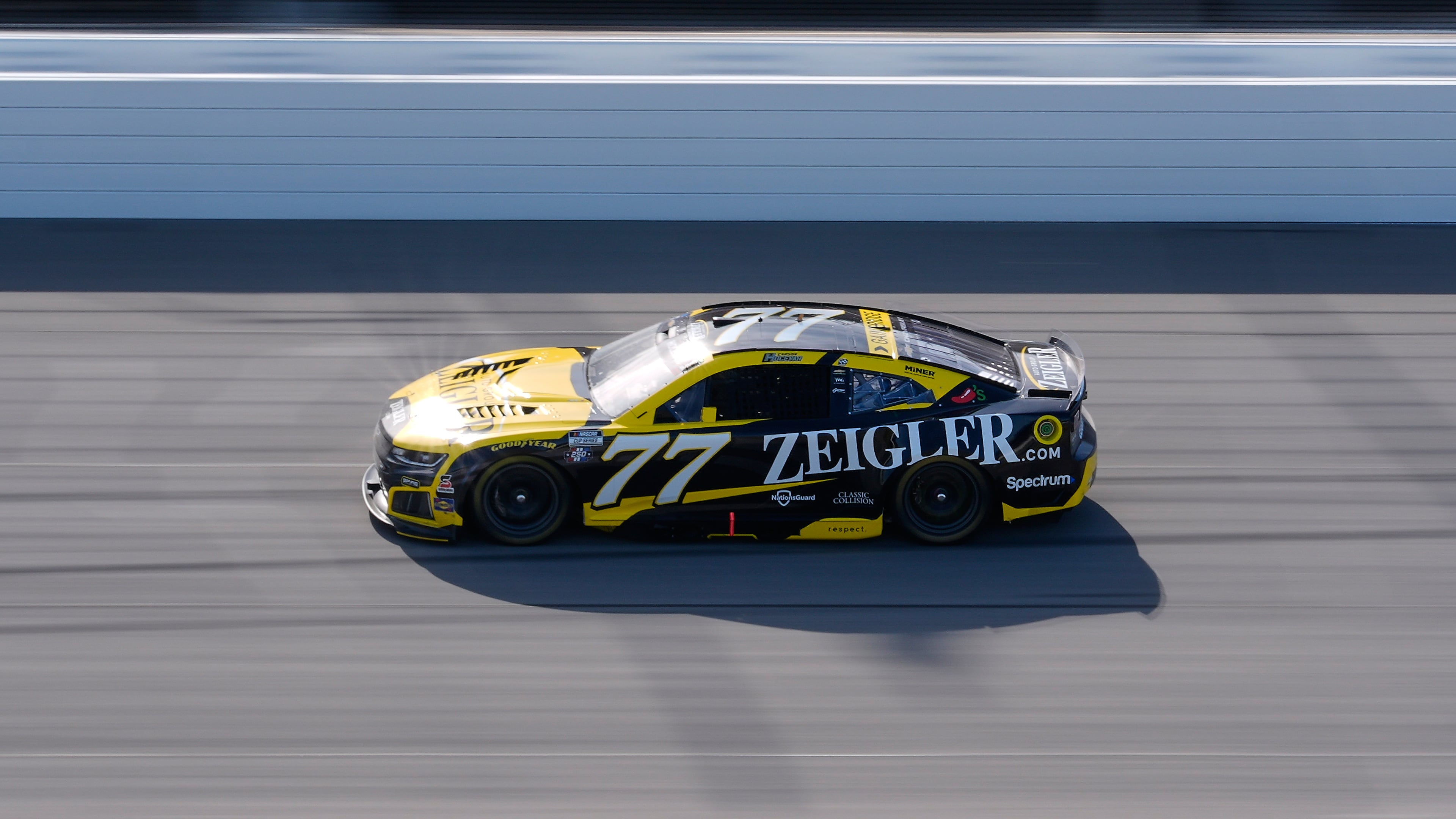 Carson Hocevar (77) drives during a NASCAR Cup Series auto race at Michigan International Speedway in Brooklyn, Mich., Sunday, June 7, 2026. (AP Photo/Paul Sancya)