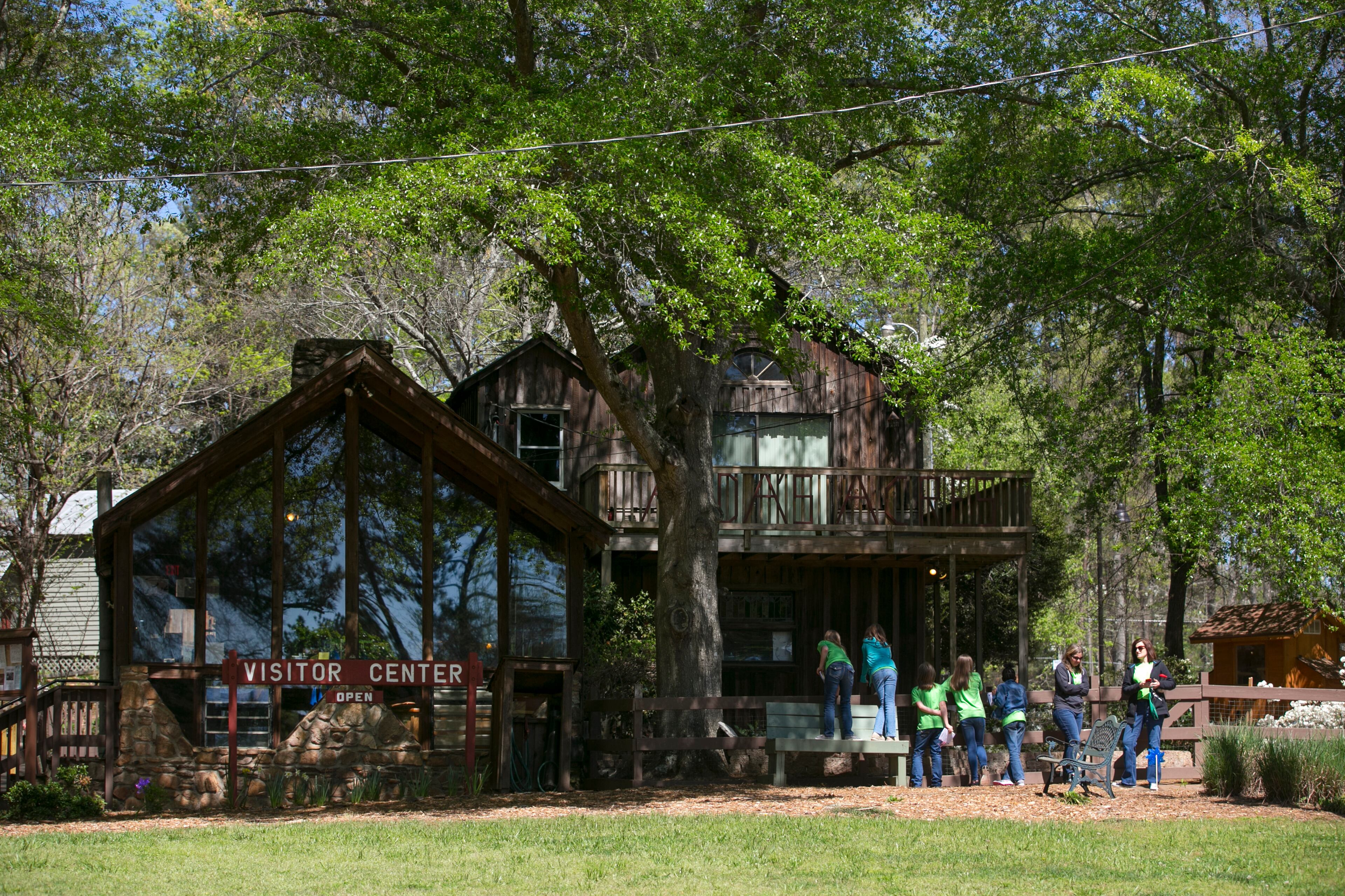 April 2, 2016 - Johns Creek, Ga: Visitors watch the animals in the outdoor animal pens next to the Visitors' Center at the Autrey Mill Nature Preserve and Heritage Center Saturday, April 2, 2016, in Johns Creek, Ga. This is for the insider's guide feature about the Newtown neighborhood. PHOTO / JASON GETZ