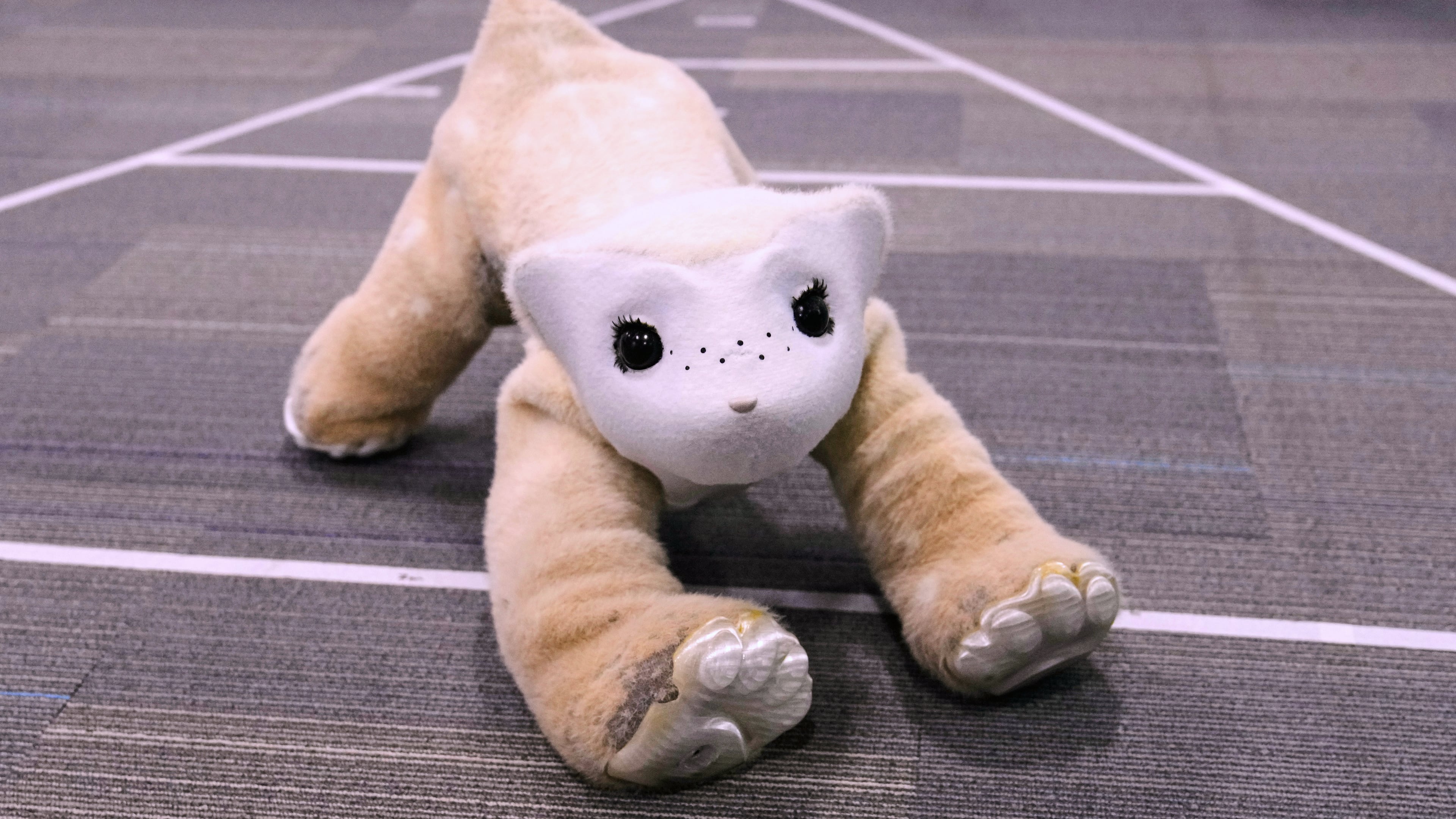Familiar, an AI pet robot, interacts during a demonstration at the Massachusetts-based startup Familiar Machines & Magic, Wednesday, April 29, 2026, in Woburn, Mass. (AP Photo/Charles Krupa)