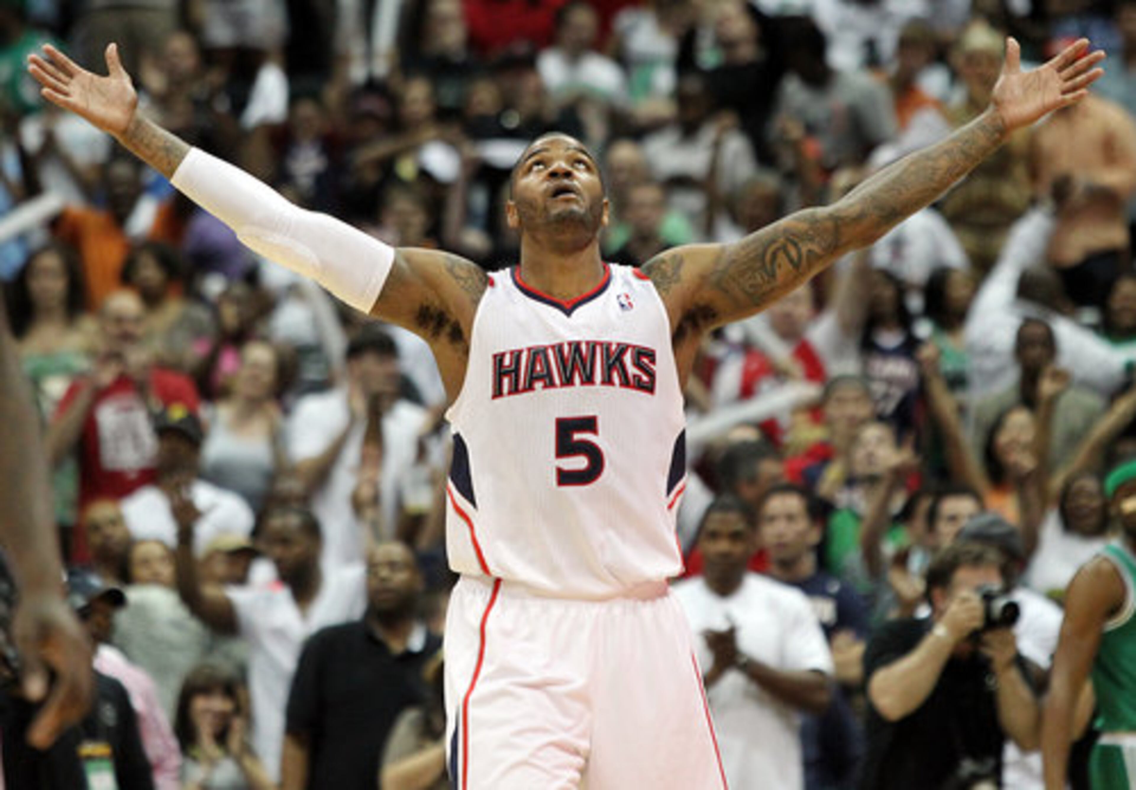 Atlanta Hawks Josh Smith reacts to winning game one of the NBA Eastern Conference first-round 83-74 over the Boston Celtics at Philips Arena in Atlanta, Sunday, April 29, 2012.