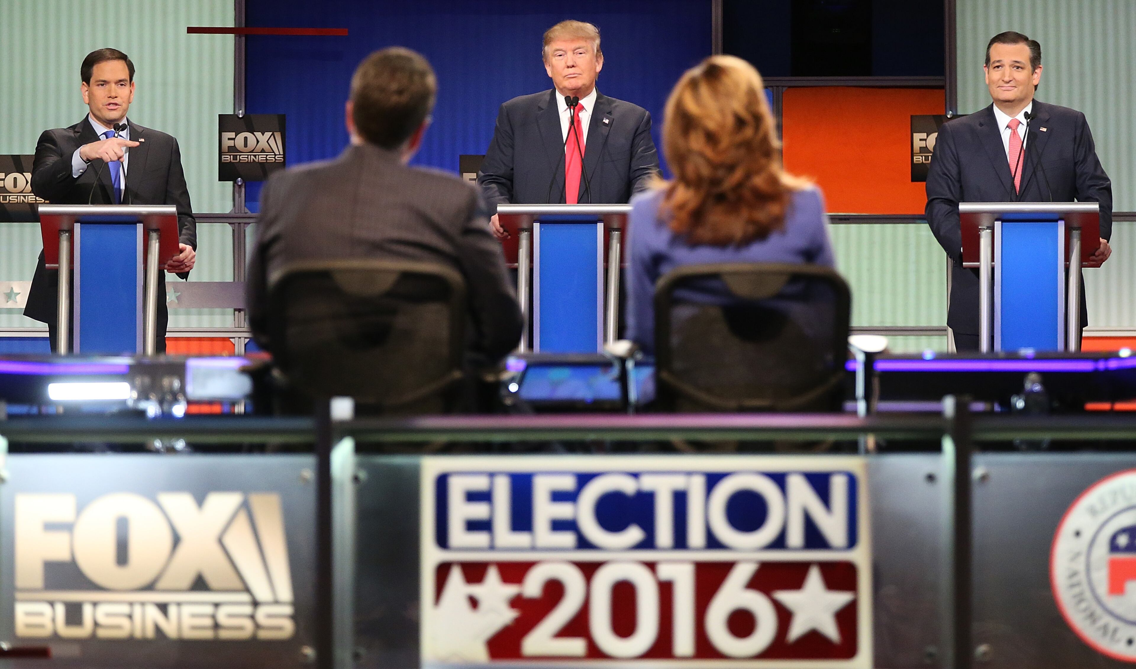 Republican presidential candidates (L-R) Sen. Marco Rubio (R-FL), Donald Trump and Sen. Ted Cruz (R-TX) participate in the Fox Business Network Republican presidential debate at the North Charleston Coliseum and Performing Arts Center on January 14, 2016 in North Charleston, South Carolina. (Photo by Scott Olson/Getty Images)