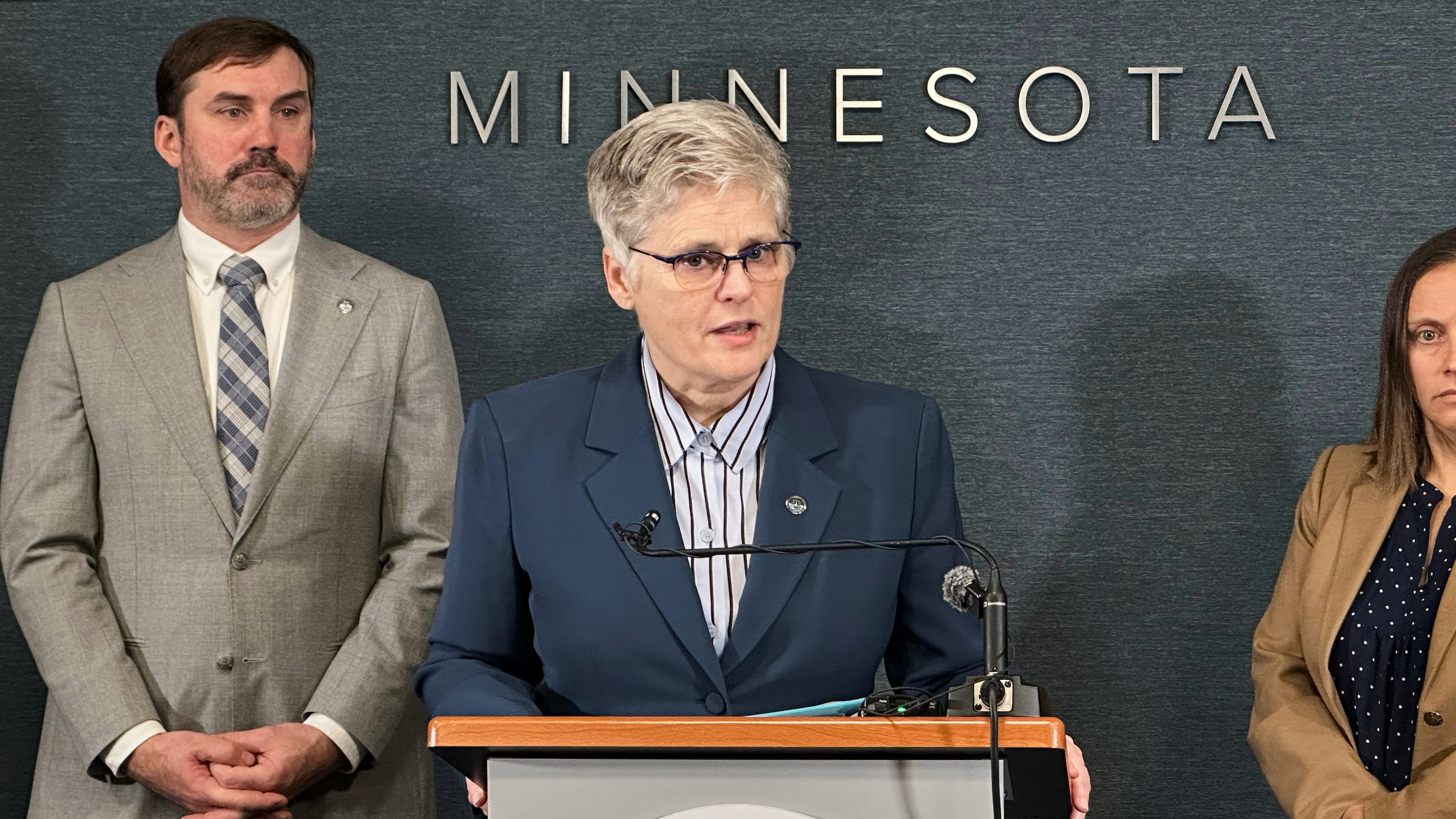 In this photo made with a smartphone, Hennepin County Attorney Mary Moriarty announces charges related to identity theft in the state's primary election Wednesday, Oct. 28, 2026, in Minneapolis. (AP Photo/Mark Vancleave)