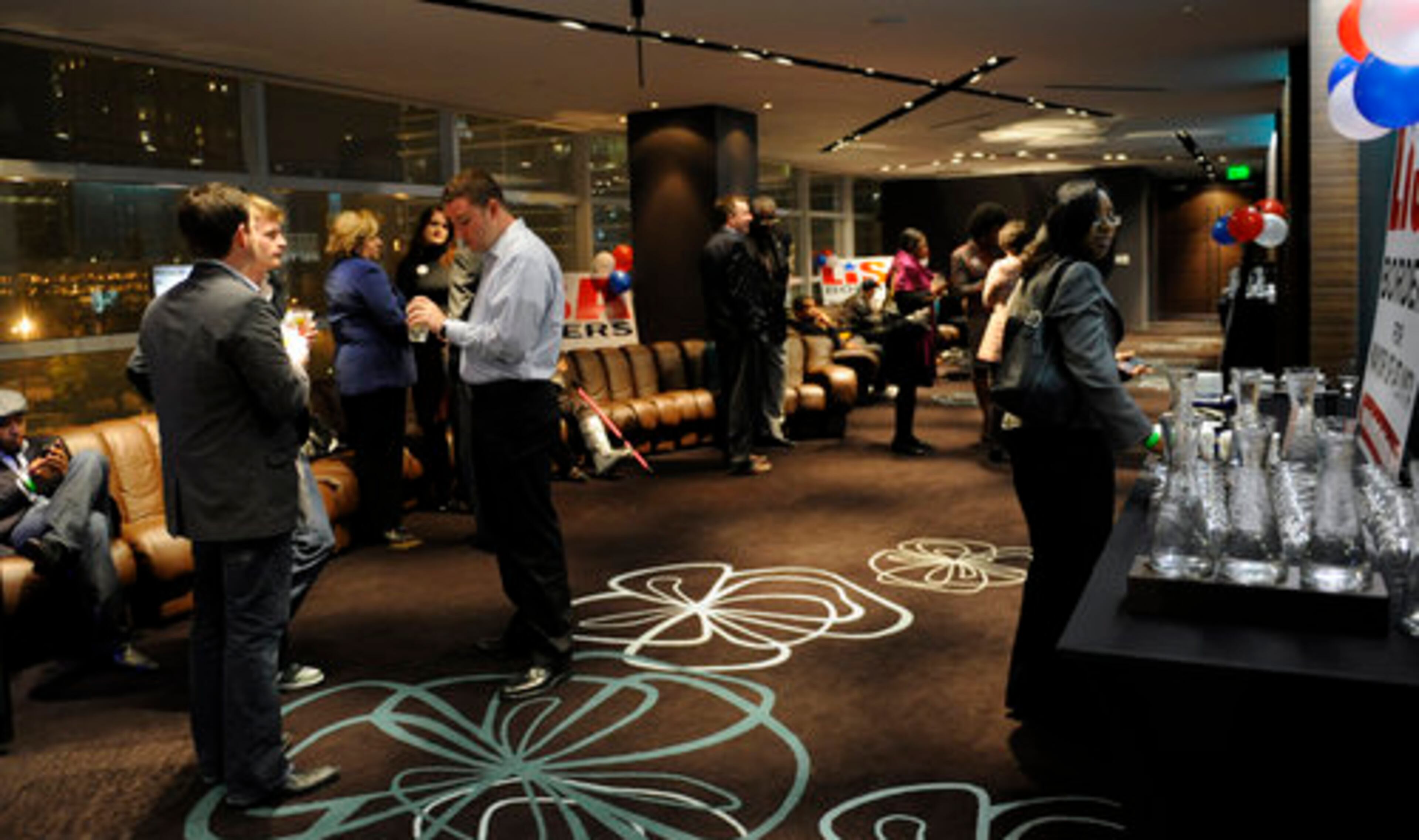 Supporters begin to trickle into the election party.