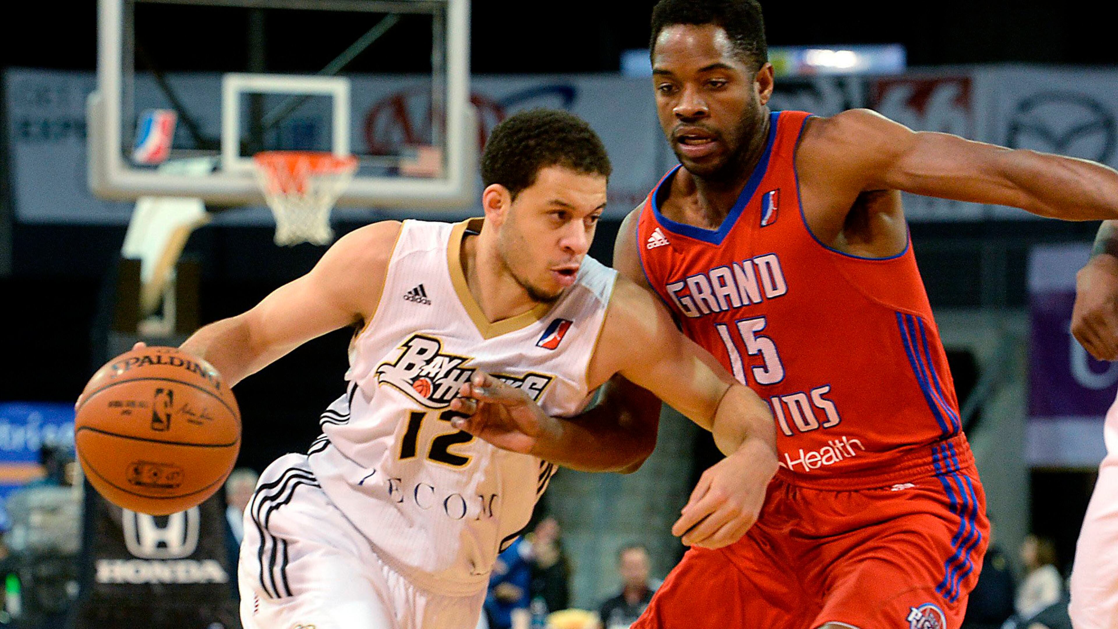 In a file photo, Erie BayHawks’ Seth Curry tries to get past Grand Rapids Drive’s Kelsey Barlow during an NBA D League basketball game Saturday, Jan. 10, 2015, in Erie, Pa. (AP Photo/Erie Times-News, Jack Hanrahan)