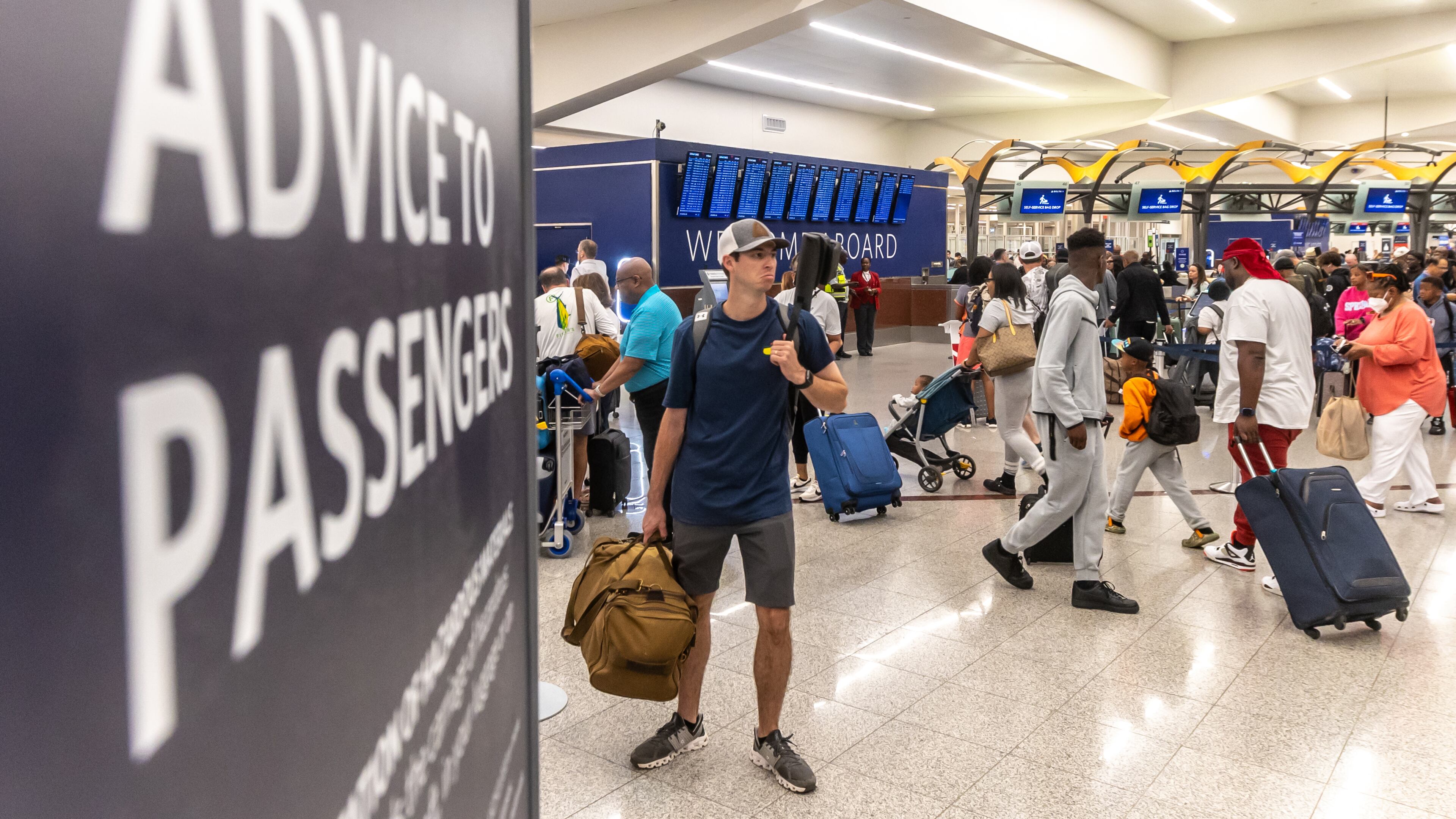 Travelers swelled Atlanta’s Hartsfield-Jackson International Airport on Friday, May 24, 2024. (John Spink/AJC)