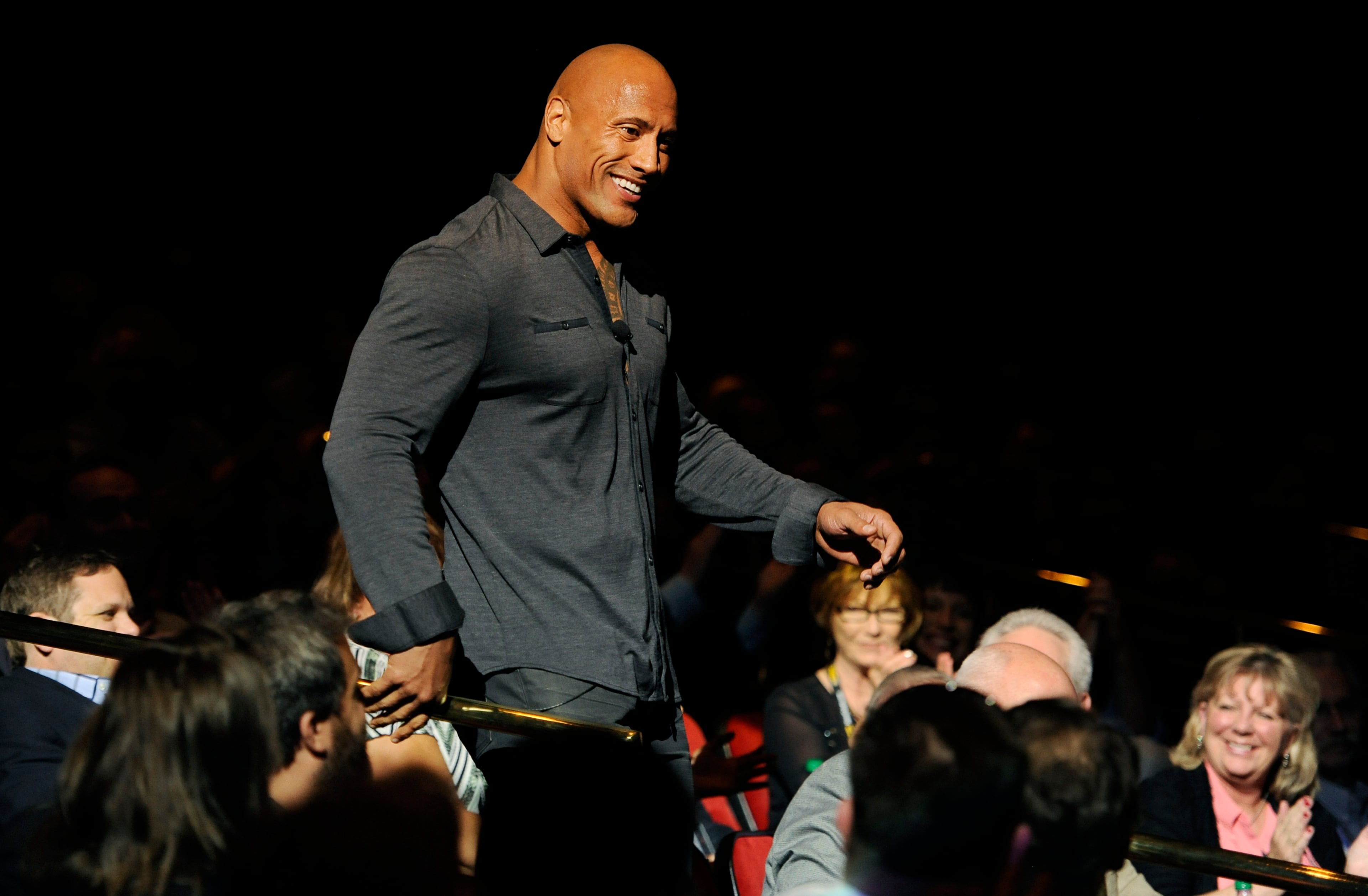 Dwayne Johnson, star of the upcoming film "Hercules," is introduced in the audience during the Opening Night Presentation from Paramount Pictures at CinemaCon 2014 on Monday, March 24, 2014, in Las Vegas. (Photo by Chris Pizzello/Invision/AP)