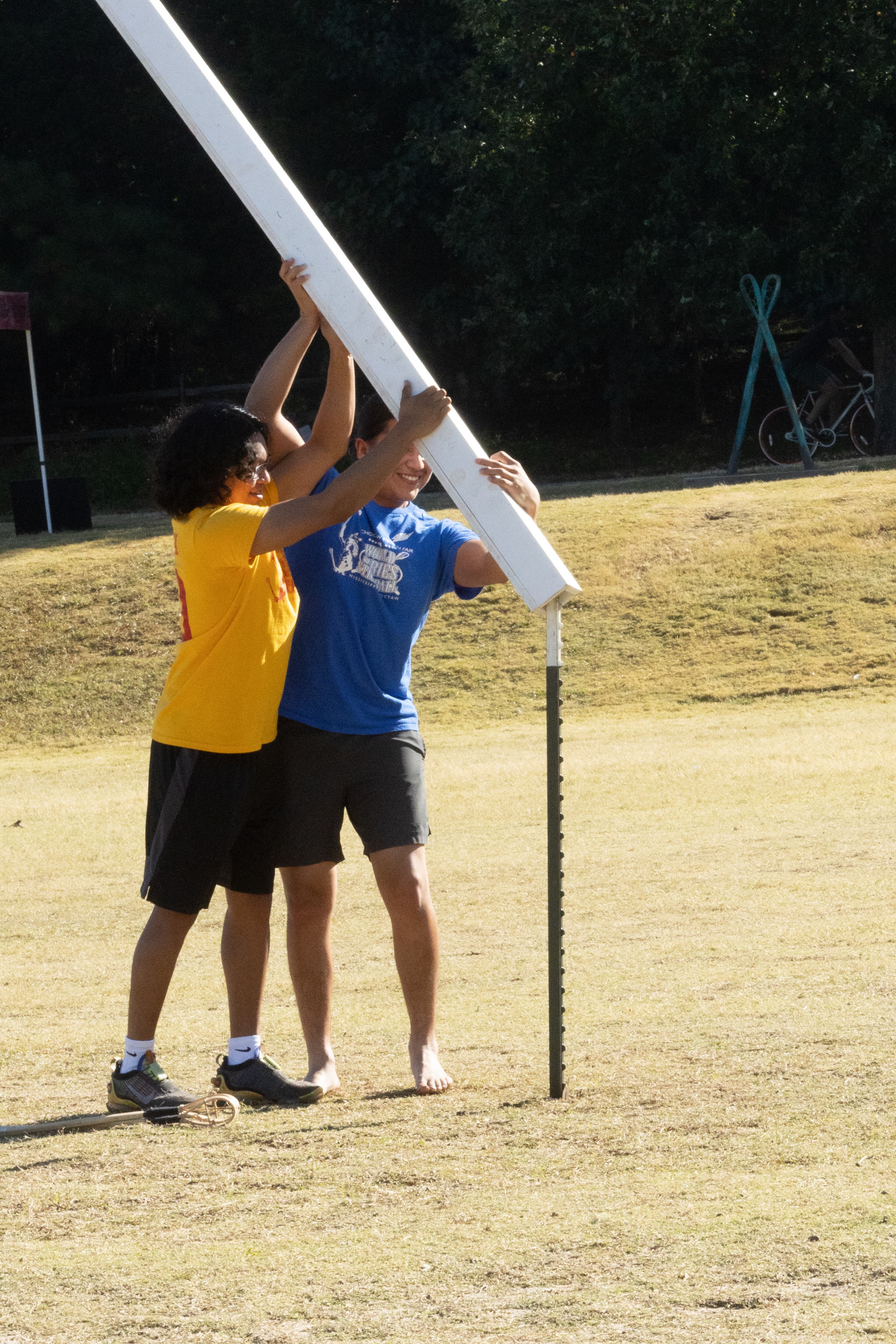 Brayson Samuel (left) and Cameron Jenkins get the field ready before the start of the Indigenous Stickball public tournament at the Historic Fourth Ward Skatepark Saturday, Oct. 15, 2022. Indigenous Stickball is considered to be one of the oldest team sports in North America. (Photo: Steve Schaefer / steve.schaefer@ajc.com)