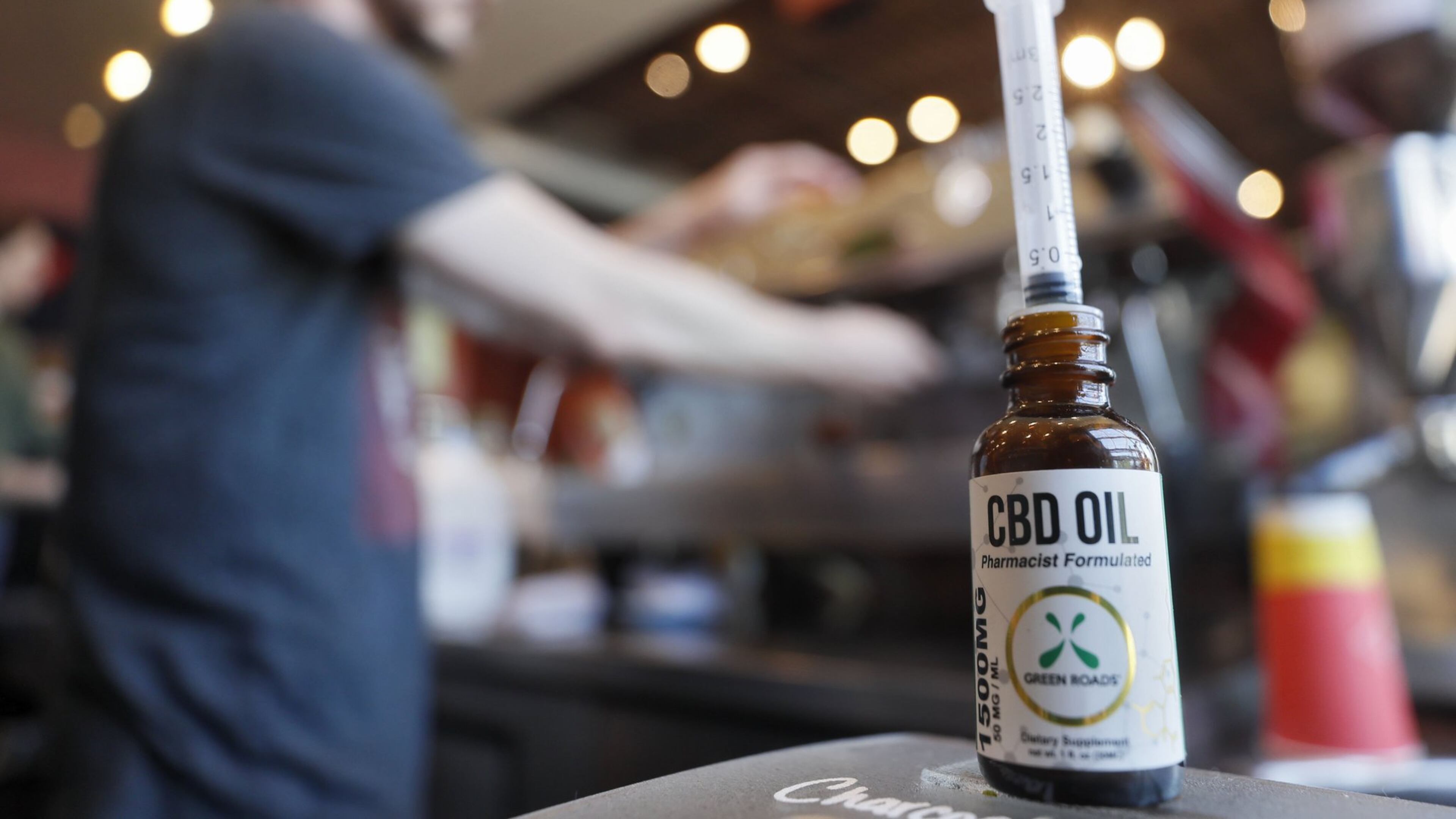 Jason Hoover, barista, prepares espresso drinks at Rev Coffee in Smyrna, which offers a CBD oil latte as well as the option to add it to any beverage. Cannabidiol oil products are gaining in popularity. They use a syringe to measure 10 ml shots. Bob Andres / bandres@ajc.com