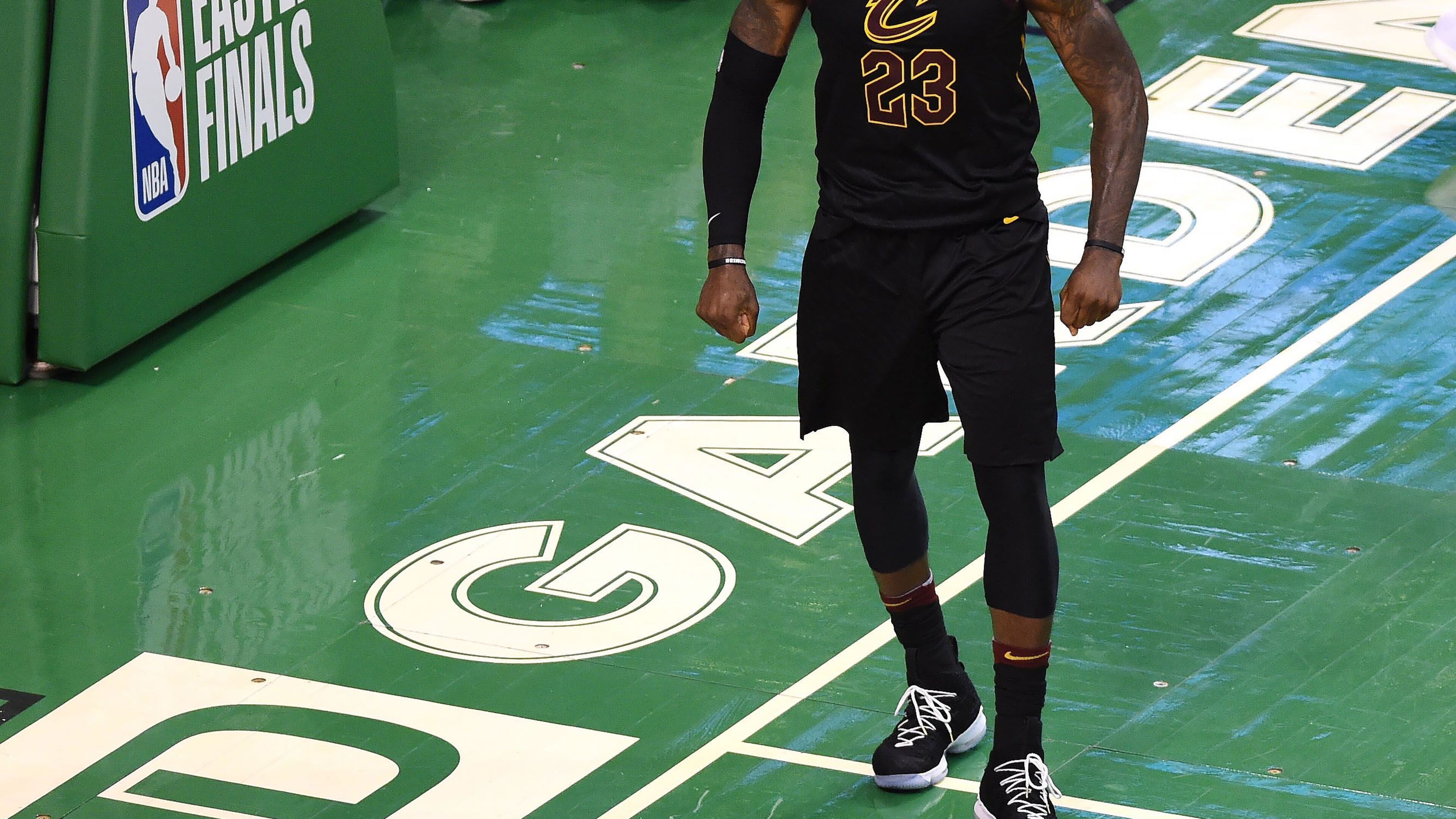 Cleveland Cavaliers forward LeBron James (23) reacts after making a basket during the second half in game seven of the Eastern conference finals of the 2018 NBA Playoffs against the Boston Celtics at TD Garden.