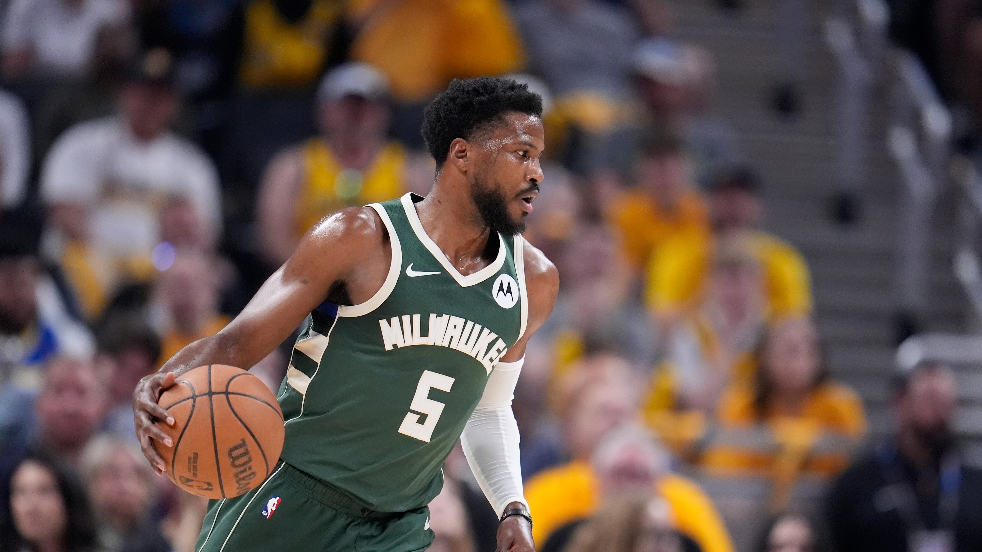 FILE - Milwaukee Bucks' Malik Beasley dribbles during the first half of Game 4 of the first round NBA playoff basketball series against the Indiana Pacers, April 28, 2024, in Indianapolis. (AP Photo/Michael Conroy, file)
