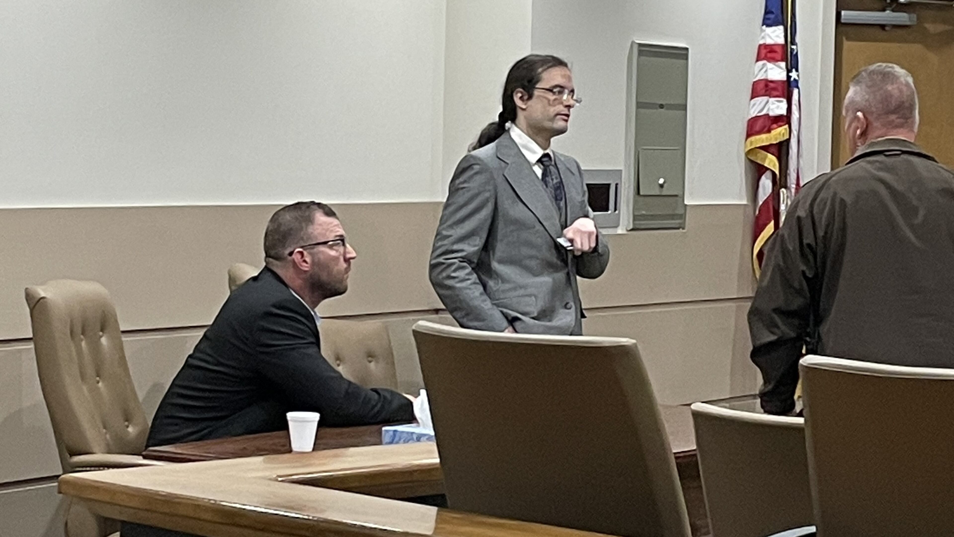 Neo-Nazi activist Michael Weaver, left, and attorney Justin Showalter, center, at a hearing in the Bartow County Courthouse in February 2023. In an opinion this month, the Georgia Court of Appeals refused to overturn a ruling dismissing his libel lawsuit, which required him to pay $20,000 in attorney fees.