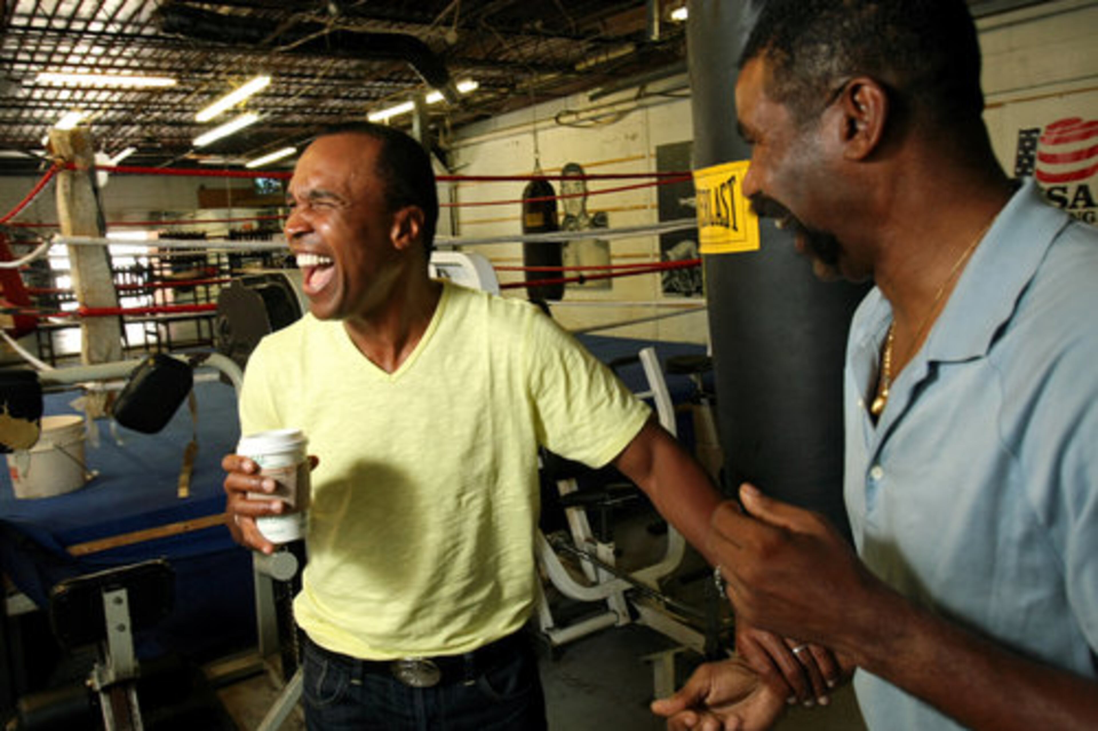 Sugar Ray Leonard shares a laugh with Johnny Gant. In recent years, Leonard, who won boxing championships in five weight divisions at least 25 years ago, has been on a boxing reality show and on "Dancing With the Stars."