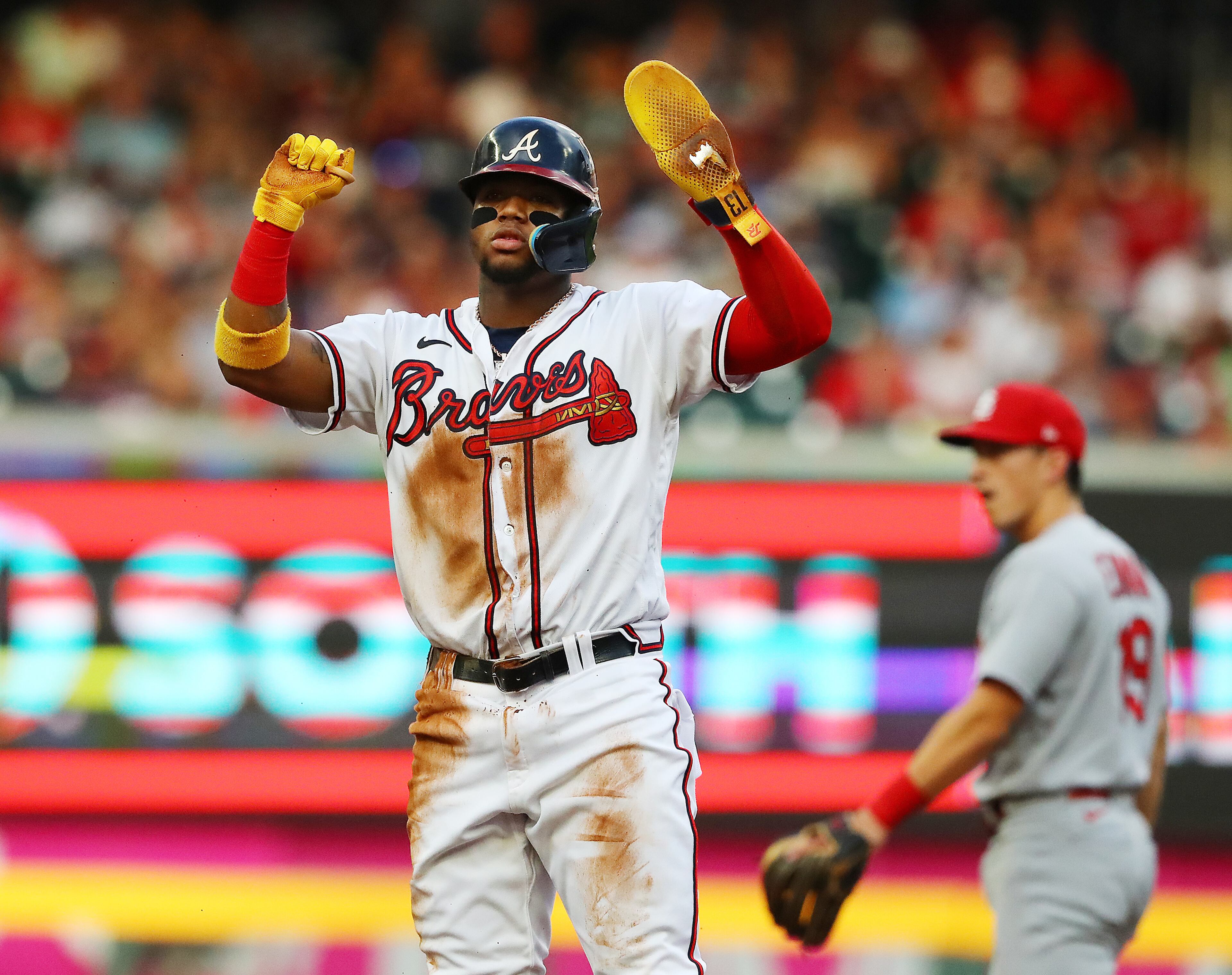 Ronald Acuna reacts to the Atlanta Braves dugout after stealing second base against the St. Louis Cardinals during the first inning in a MLB baseball game on Tuesday, July 5, 2022, in Atlanta. “Curtis Compton / Curtis.Compton@ajc.com”