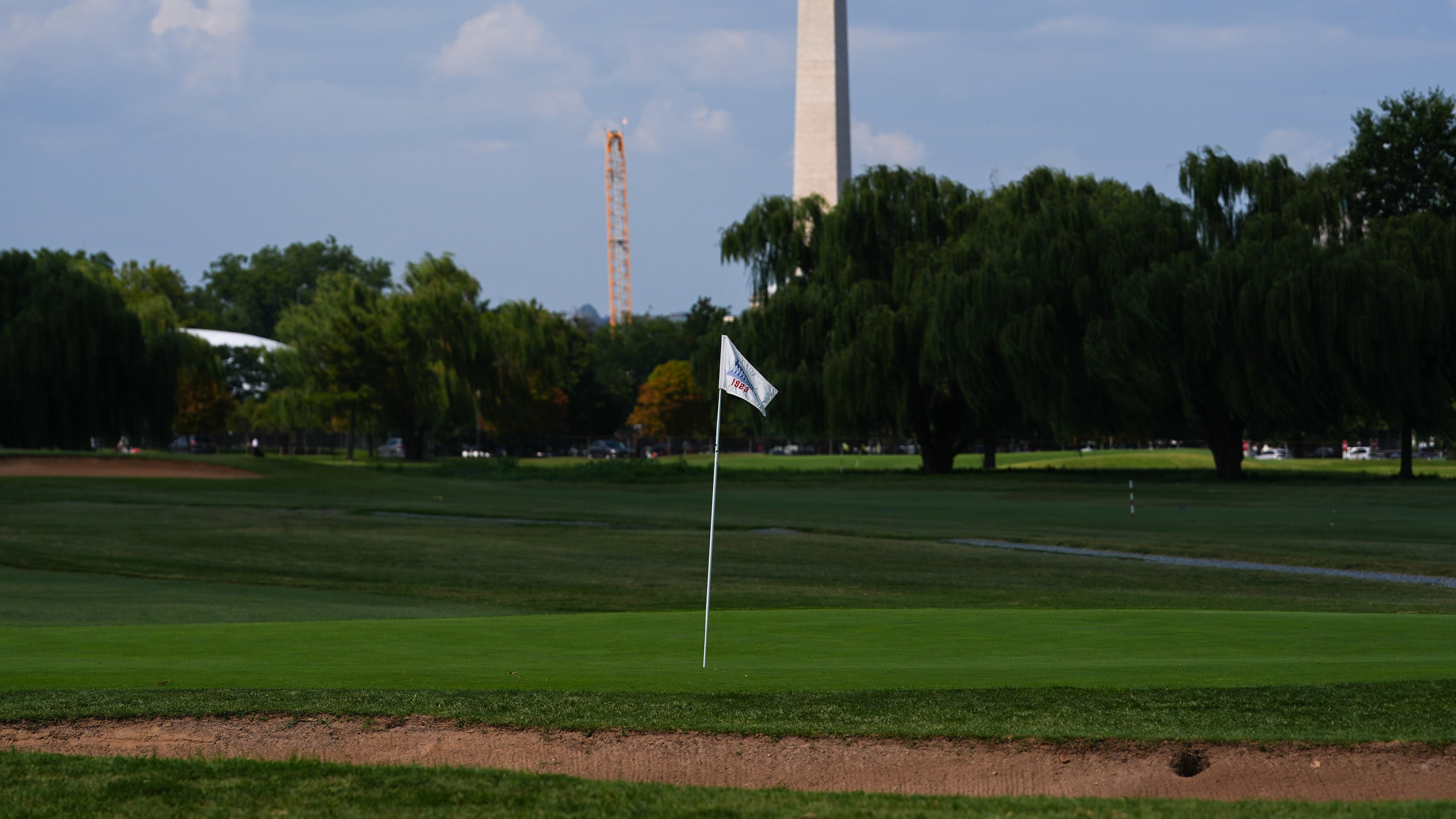 The Washington Monument is seen beyond the East Potomac Park Golf Course, Tuesday, Sept. 1, 2026, in Washington. (AP Photo/Julia Demaree Nikhinson)