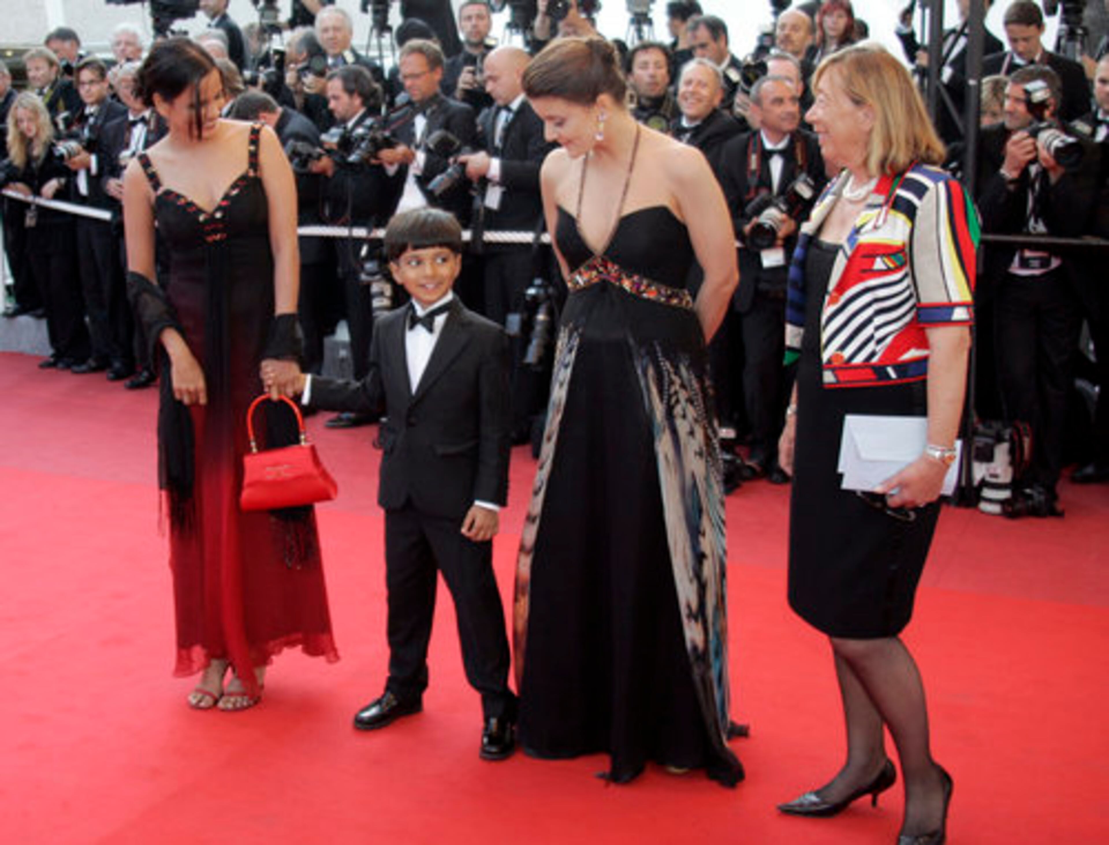 Young Ayush Manesh Khedekarl arrives with guests for the film 'Looking for Eric' at the 62nd International Cannes Film Festival in France.