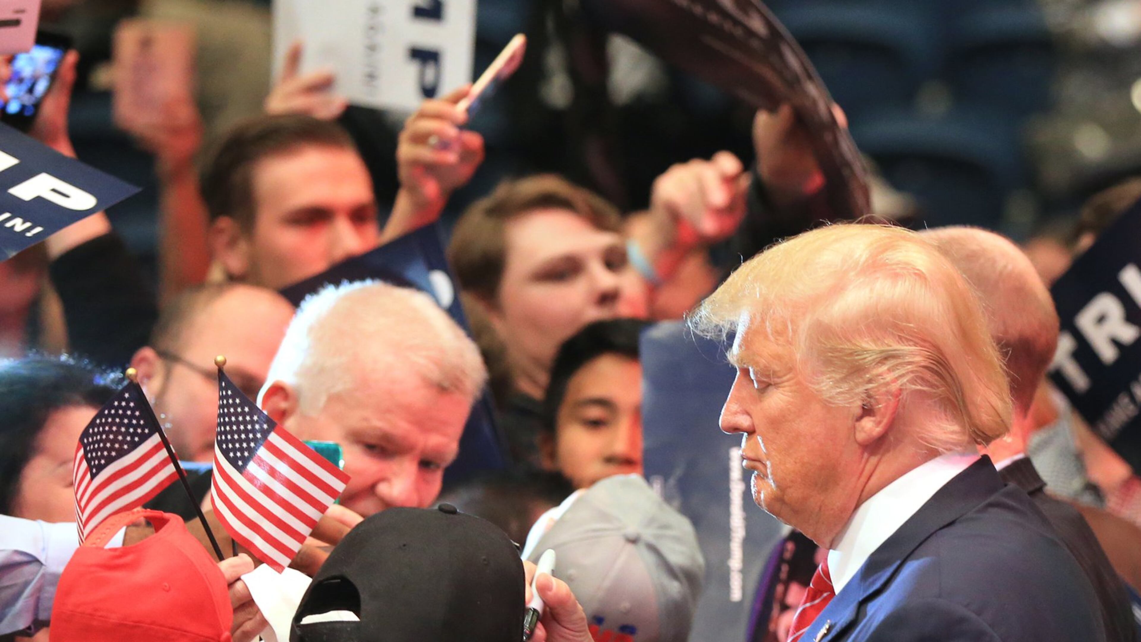113015 MACON: — Donald Trump works the crowd signing autographs at the conclusion of his second campaign visit to Georgia at the Macon Centreplex Coliseum on Monday, Nov. 30, 2015, in Macon. Curtis Compton / ccompton@ajc.com