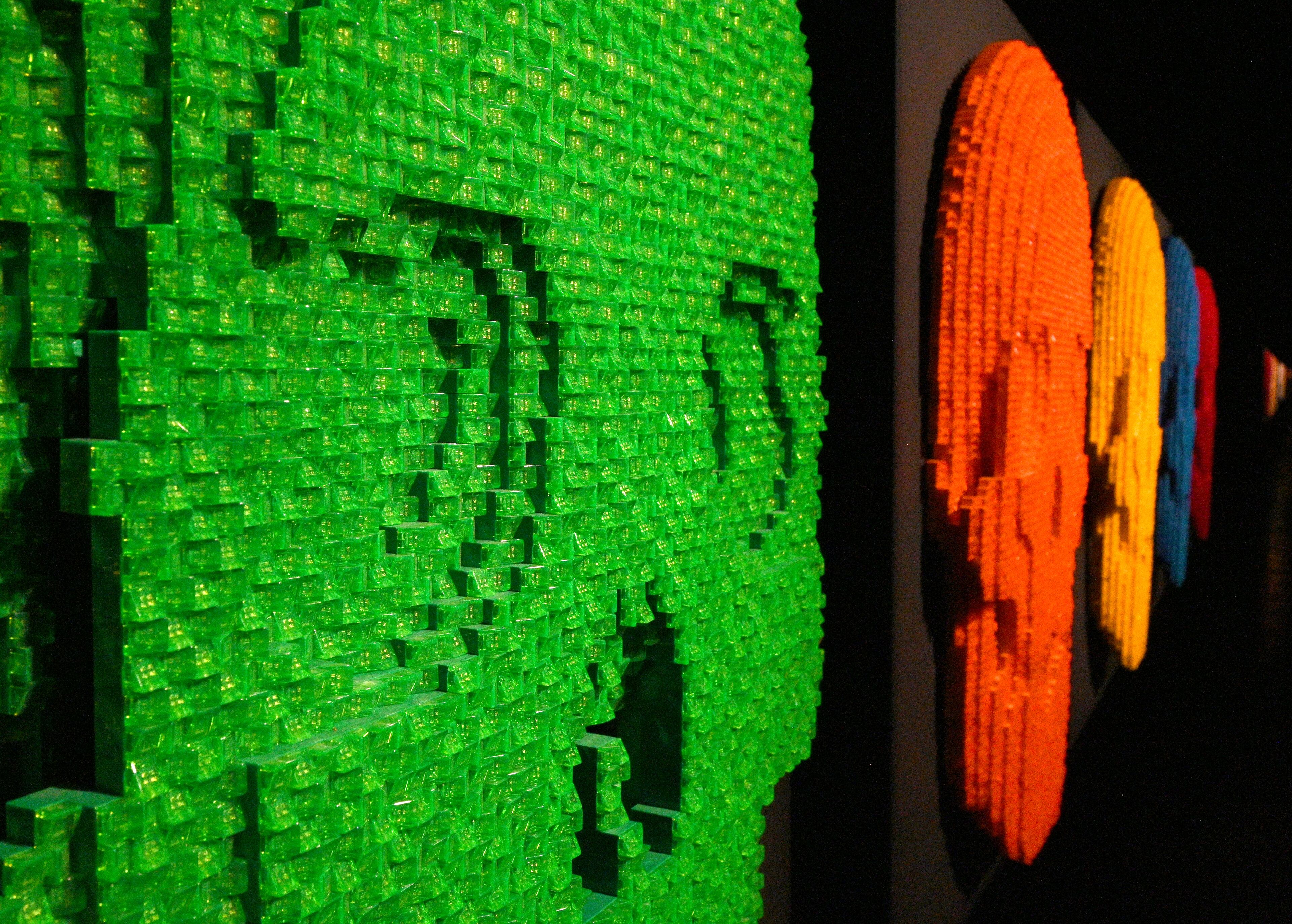 Lego sculptures in “Mask” room at "Art of the Brick Immersive Experience" exhibition at Exhibition Hub Atlanta Art Centre, Wednesday, April 19, 2023, in Doraville. The exhibition will feature many pieces and themes, including a room with oversized sculptures (25-foot long), over 70 works of art crafted from more than 1 million LEGO bricks, galleries celebrating human-kind and nature, and a short documentary about how Nathan creates his works. (Hyosub Shin / Hyosub.Shin@ajc.com)