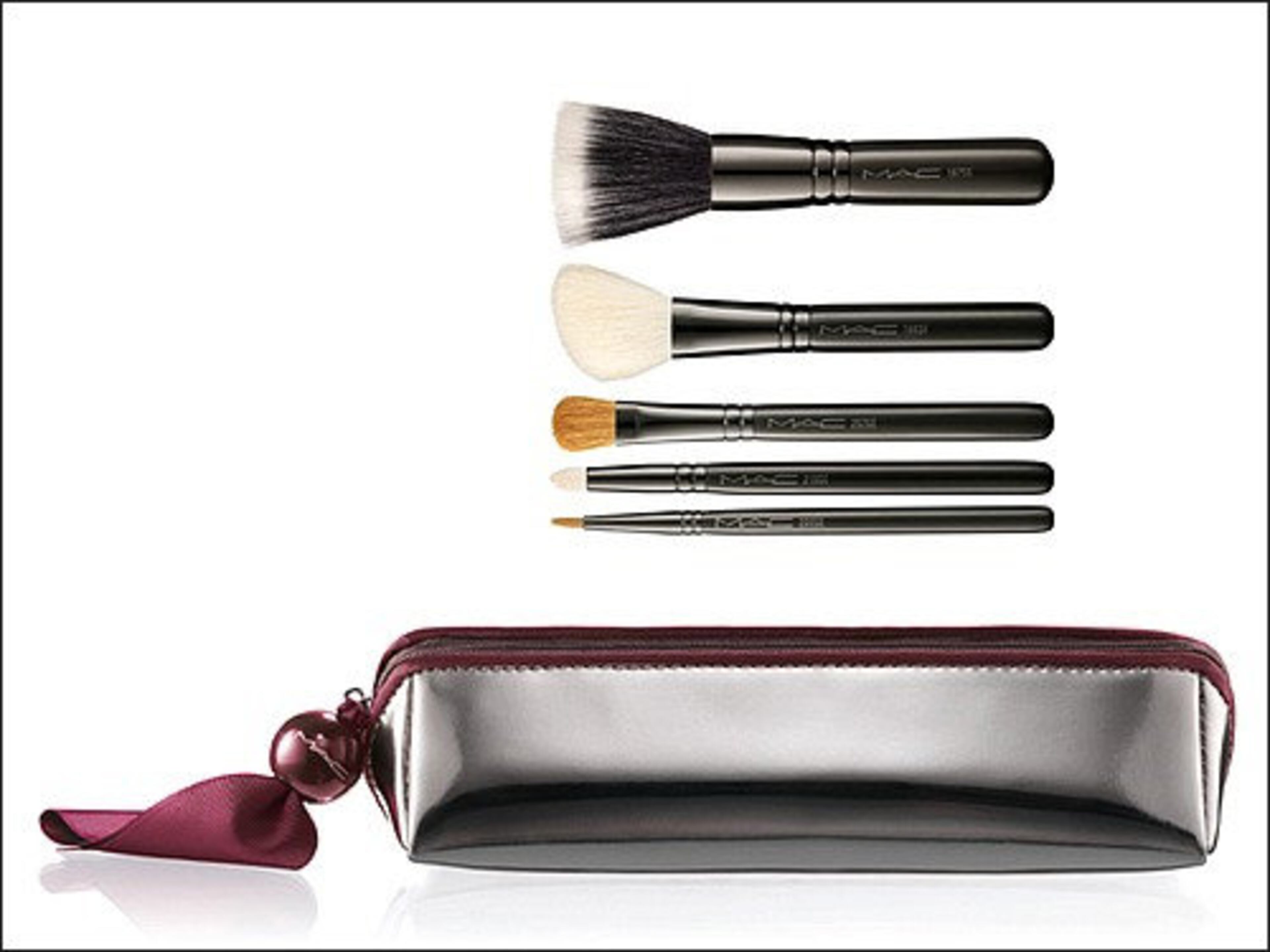 MAC Do-the-Trick Buff and Line Brushes, Limited Edition, $49.50. Exclusive brush kit of five key buff-and-line brushes in a small, rectangular makeup bag of polished silvery-pewter vinyl. Available at Macy's.