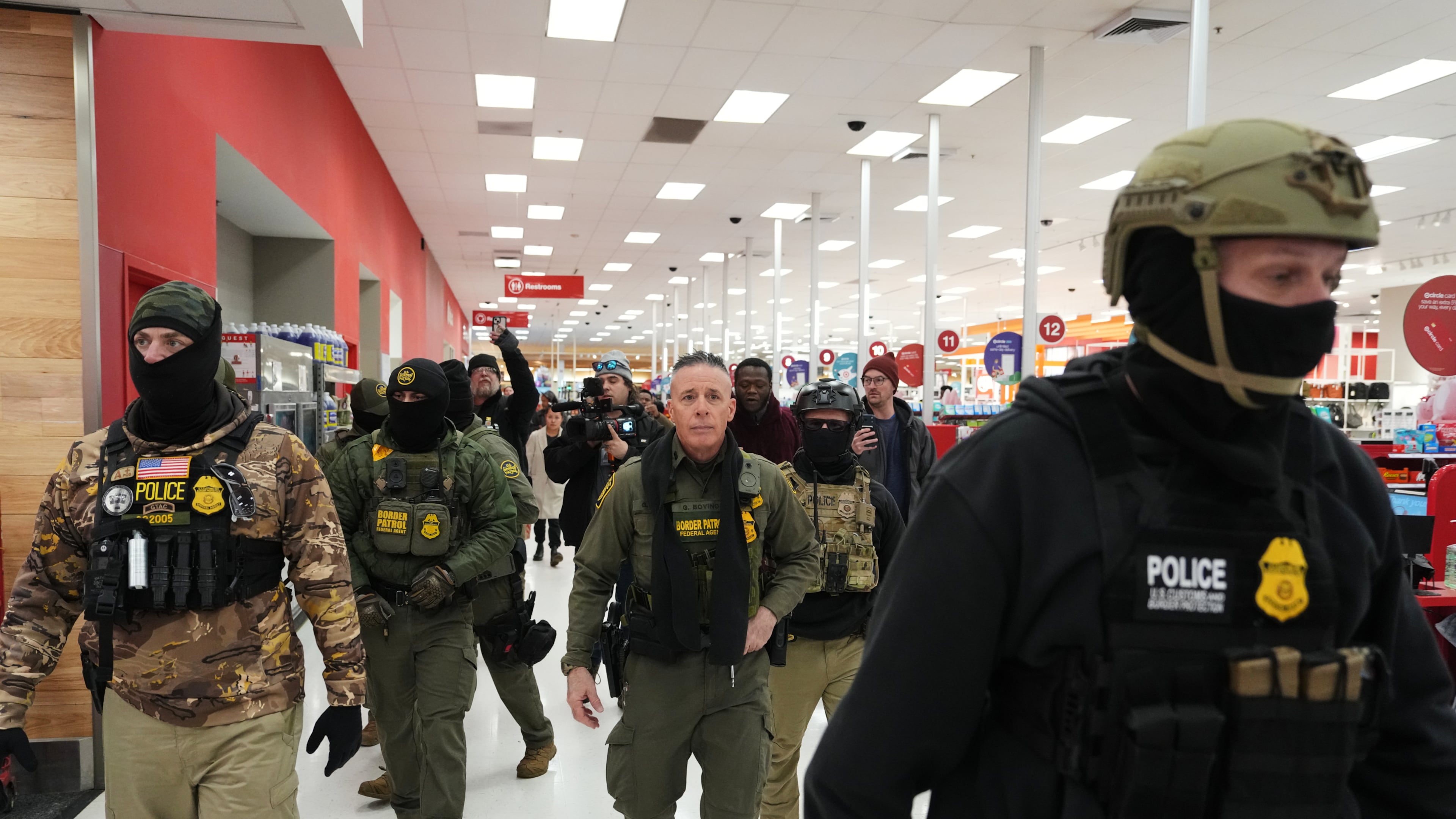 FILE - U.S. Border Patrol Cmdr. Gregory Bovino walks through a Target store Jan. 11, 2026, in St. Paul, Minn. (AP Photo/Adam Gray, File)