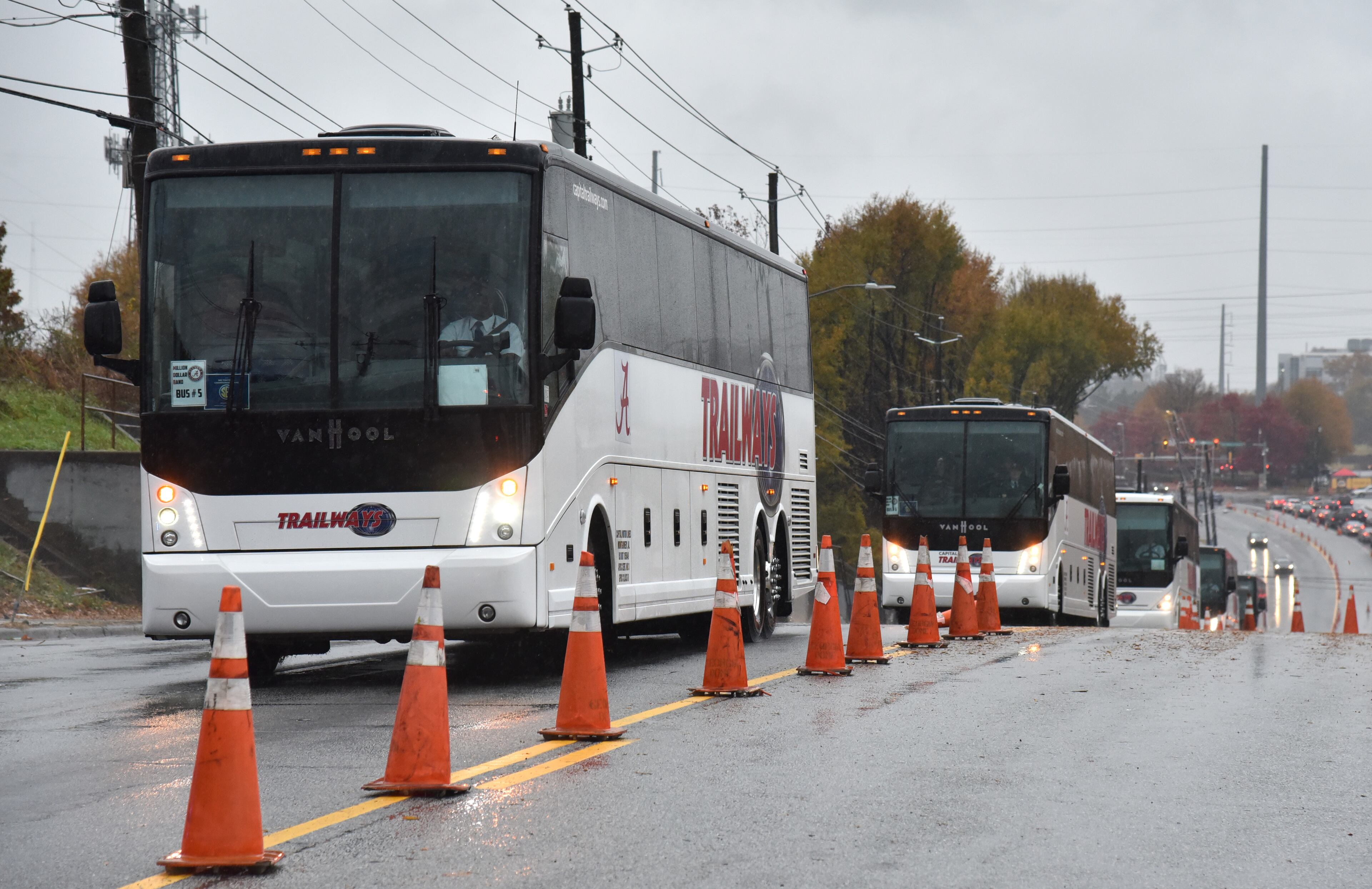 December 1, 2018 Atlanta - Alabama team buses head to Mercedes-Benz Stadium ahead of the Georgia vs Alabama SEC Football Championship on Saturday, December 1, 2018. HYOSUB SHIN / HSHIN@AJC.COM