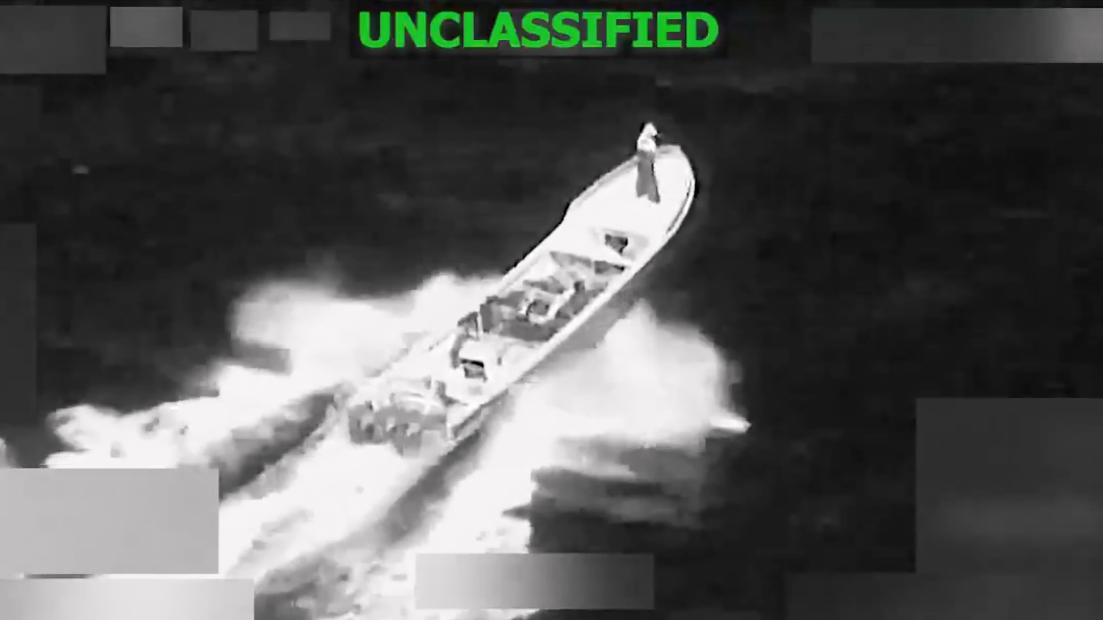 FILE - This image from video provided by U.S. South Command, shows a vessel accused of trafficking drugs in the eastern Pacific Ocean shortly before it was destroyed by the U.S. military, killing two and injuring one, on Jan. 23, 2026. (U.S. Southern Command via AP, File)