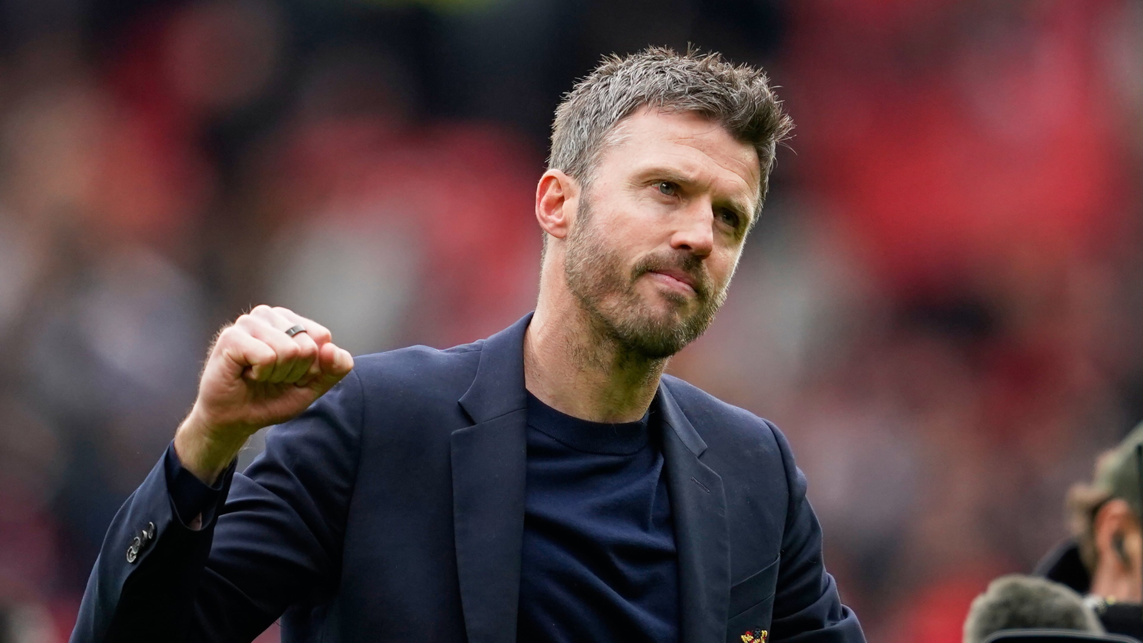 Manchester United's head coach Michael Carrick celebrates after the English Premier League soccer match between Manchester United and Liverpool in Manchester, England, Sunday, May 3, 2026. (AP Photo/Dave Thompson)