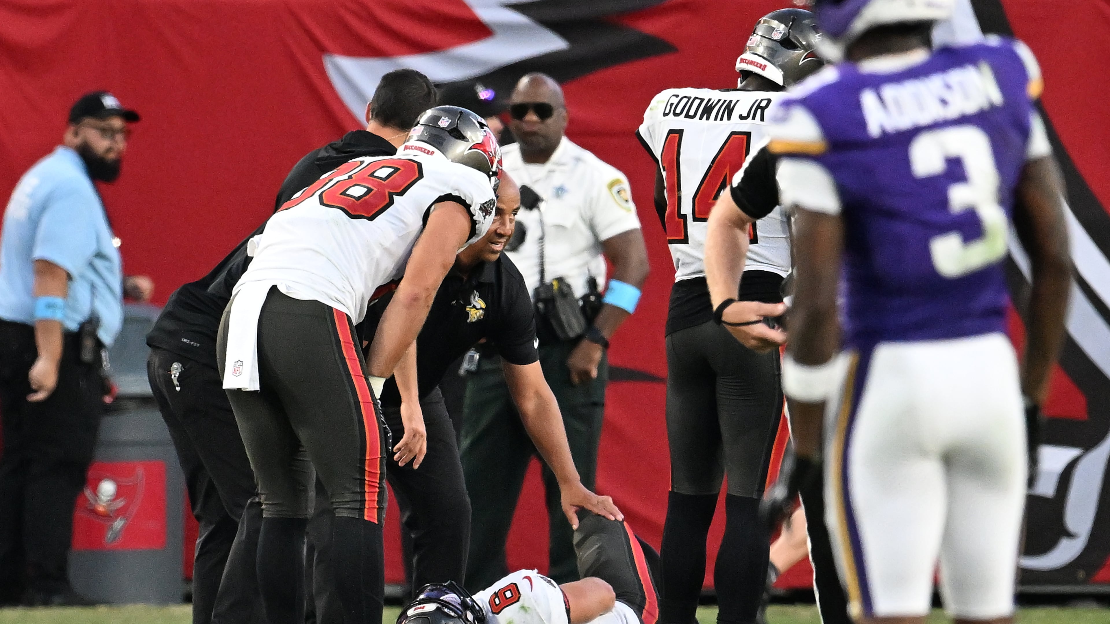 Tampa Bay Buccaneers quarterback Baker Mayfield (6) lays on the ground after sustaining an injury during the second half of an NFL football game against the Minnesota Vikings in Tampa, Fla., Sunday, Sept. 27, 2026. (AP Photo/Jason Behnken)