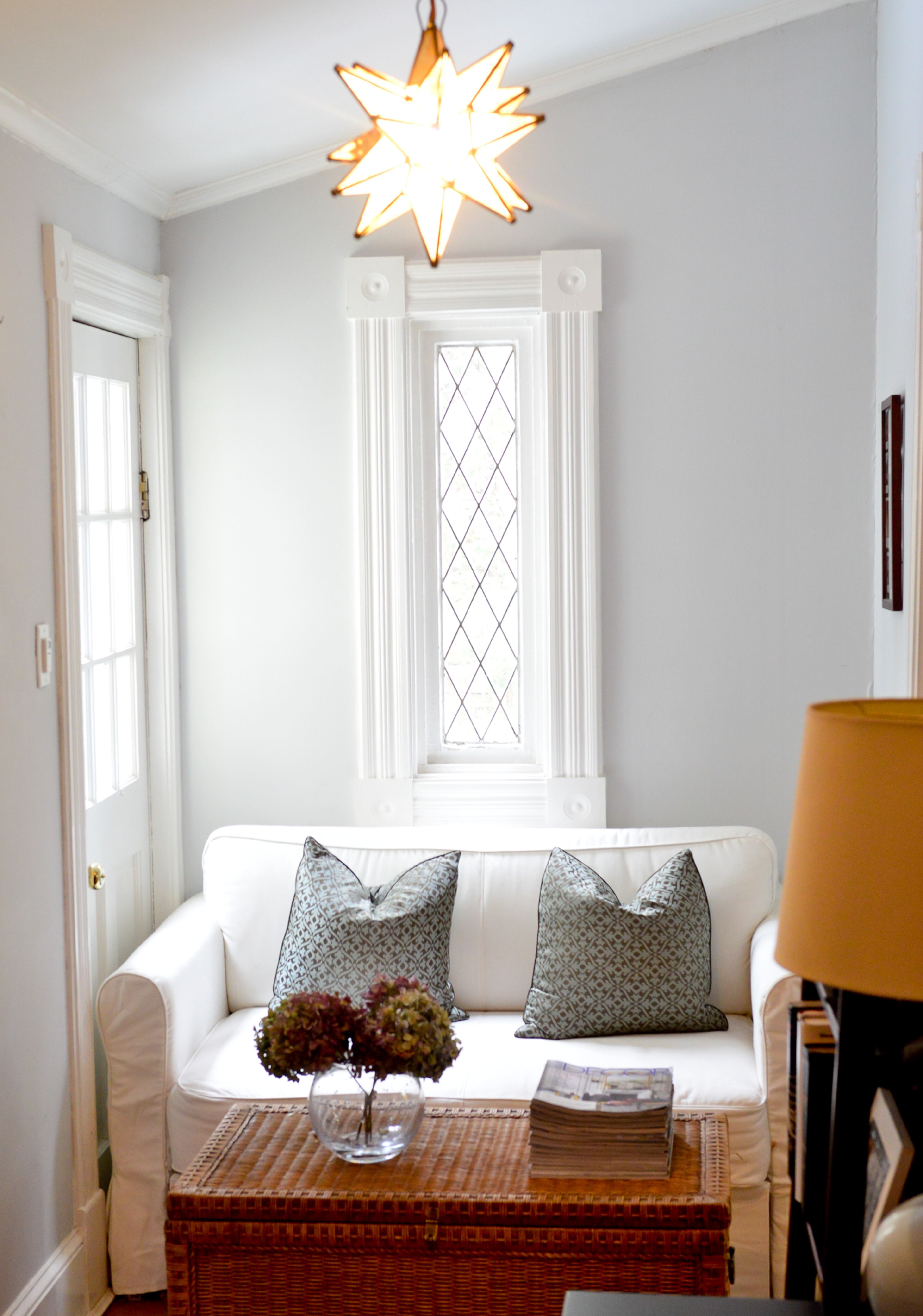 The Stowells turned this well-lit nook into a sitting area that includes a star light that already was installed when they bought the Inman Park home in 2011. The couch, which is from IKEA, pulls out into a bed for when they have extra guests, and Kendall has owned the woven table since she was in college.