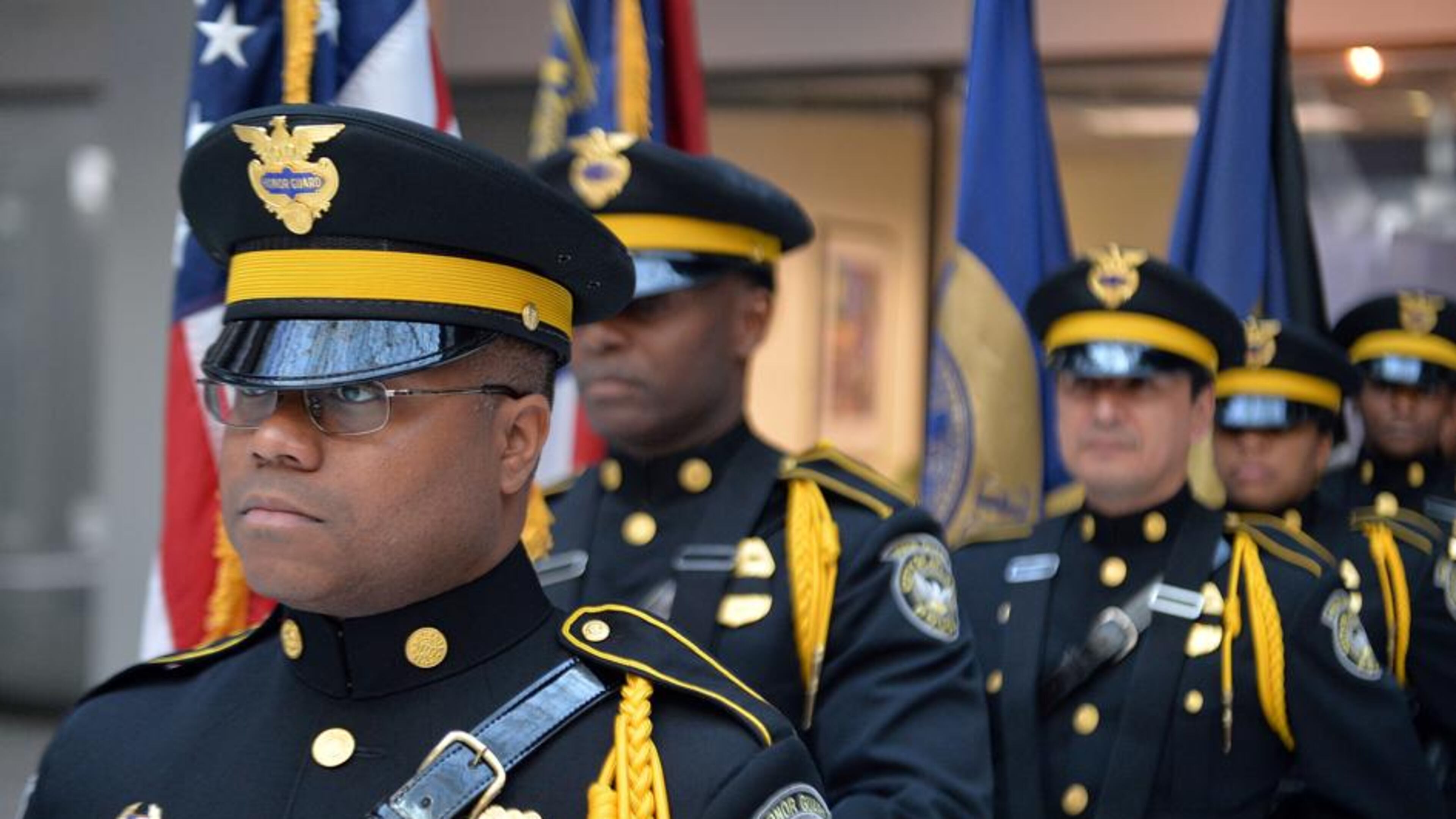Officer Dwayne Hilton and other members of the Atlanta Police Department Honor Guard await the start of the service at the Atlanta Police Department’s 24th Annual Police Memorial Service in 2015. This year’s service is Tuesday, May 8. AJC file photo