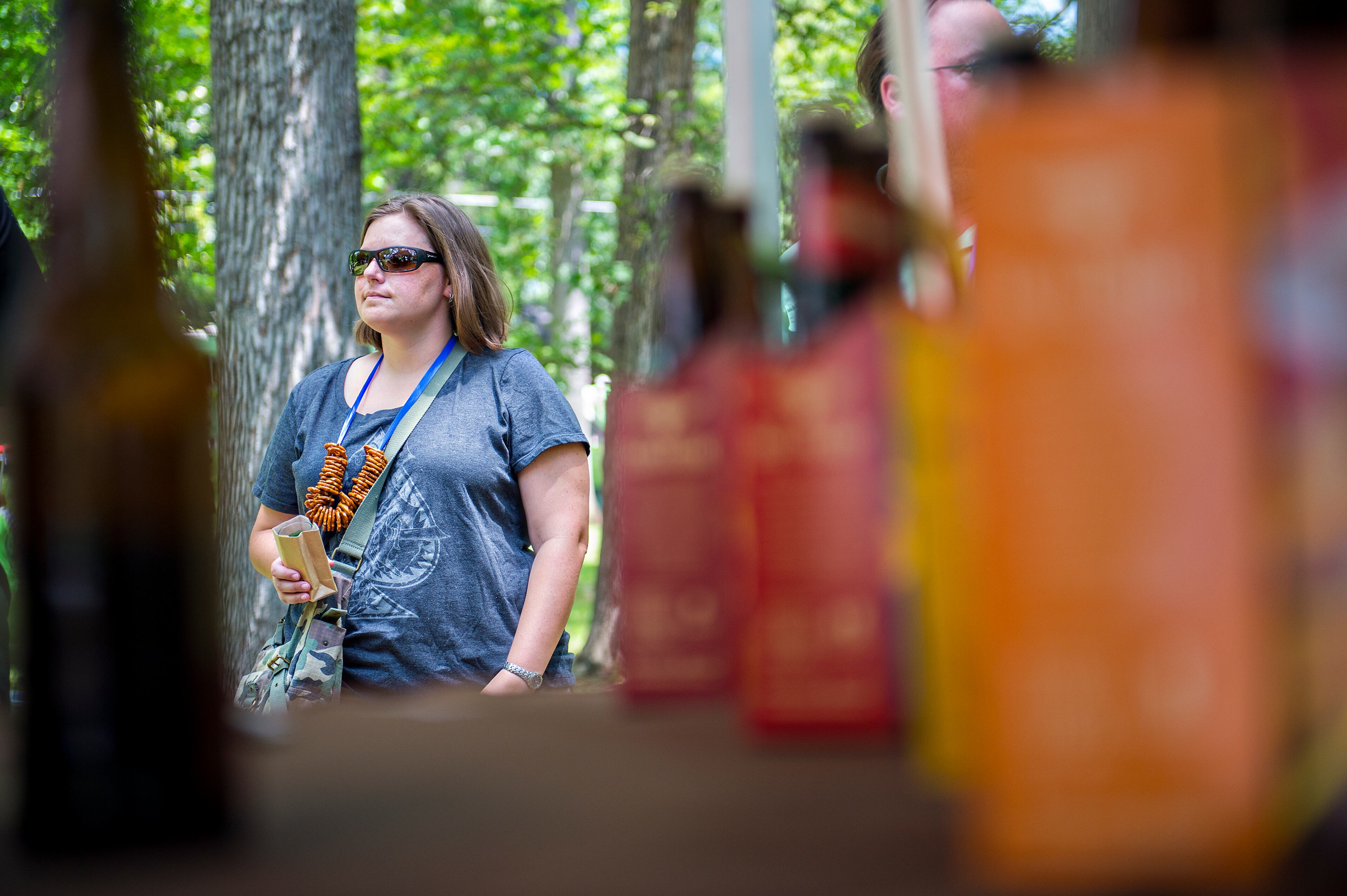 Amanda Jalutkewicz decides which beer to try next during the East Atlanta Beer Fest at Brownwood Park on Saturday, May 16, 2015. Thousands of people attended the 12th annual festival which featured 175 craft beers. JONATHAN PHILLIPS / SPECIAL