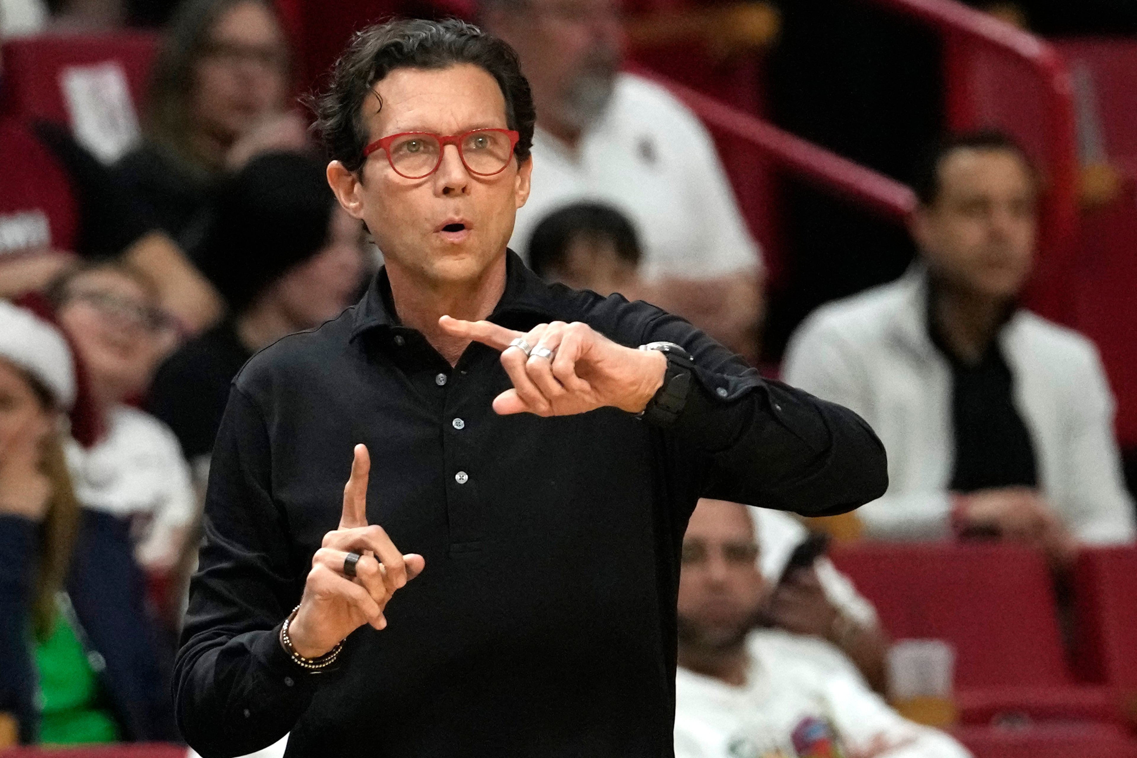 Hawks coach Quin Snyder gestures during the first half of the team's NBA basketball game against the Miami Heat, Friday, Dec. 22, 2023, in Miami. (AP Photo/Lynne Sladky)