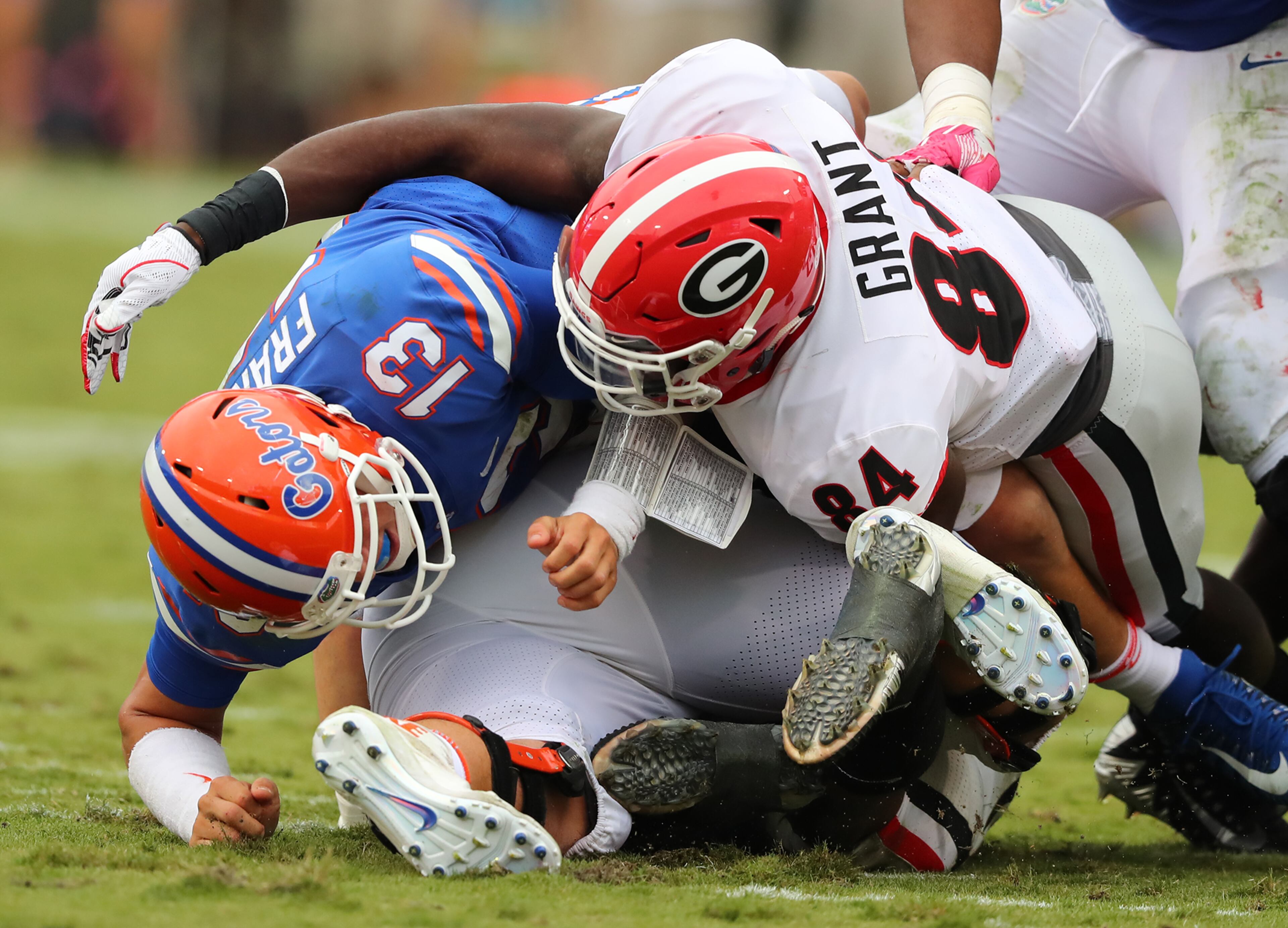 October 28, 2017 Jacksonville: Georgia linebacker Walter Grant tackles Florida quaterback Feleipe Franks during the first half in a NCAA college football game on Friday, October 27, 2017, in Jacksonville. Curtis Compton/ccompton@ajc.com