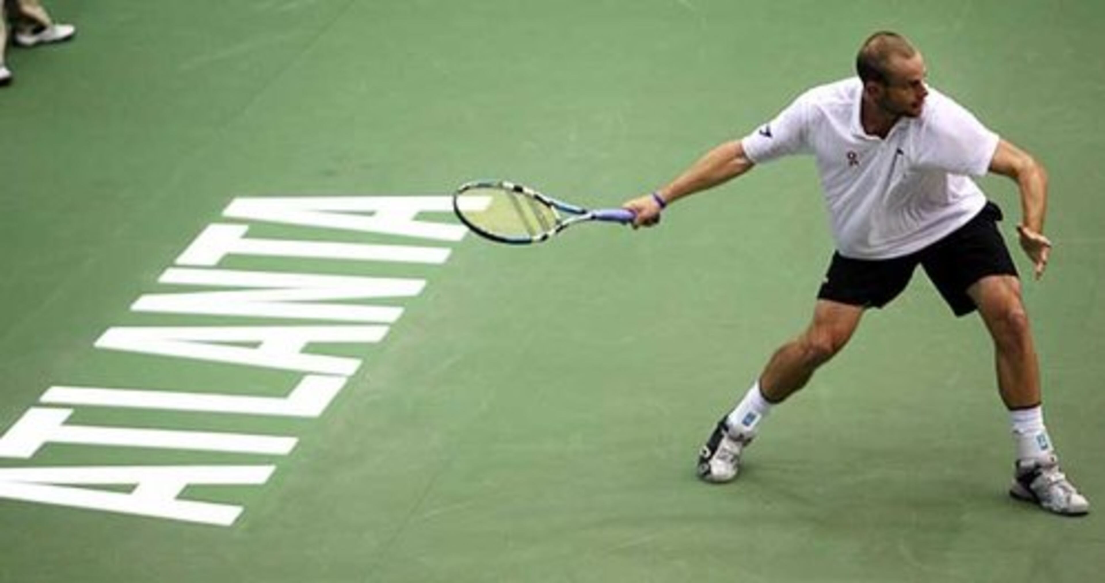 Andy Roddick prepares for a baseline forehand during a singles match against Jesse Levine at the Advanta WTT Smash Hits tennis event. The event was hosted by tennis legend Billie Jean King and music legend Sir Elton John to benefit The Elton John Aids Foundation and Atlanta Aids Partnership Fund.
