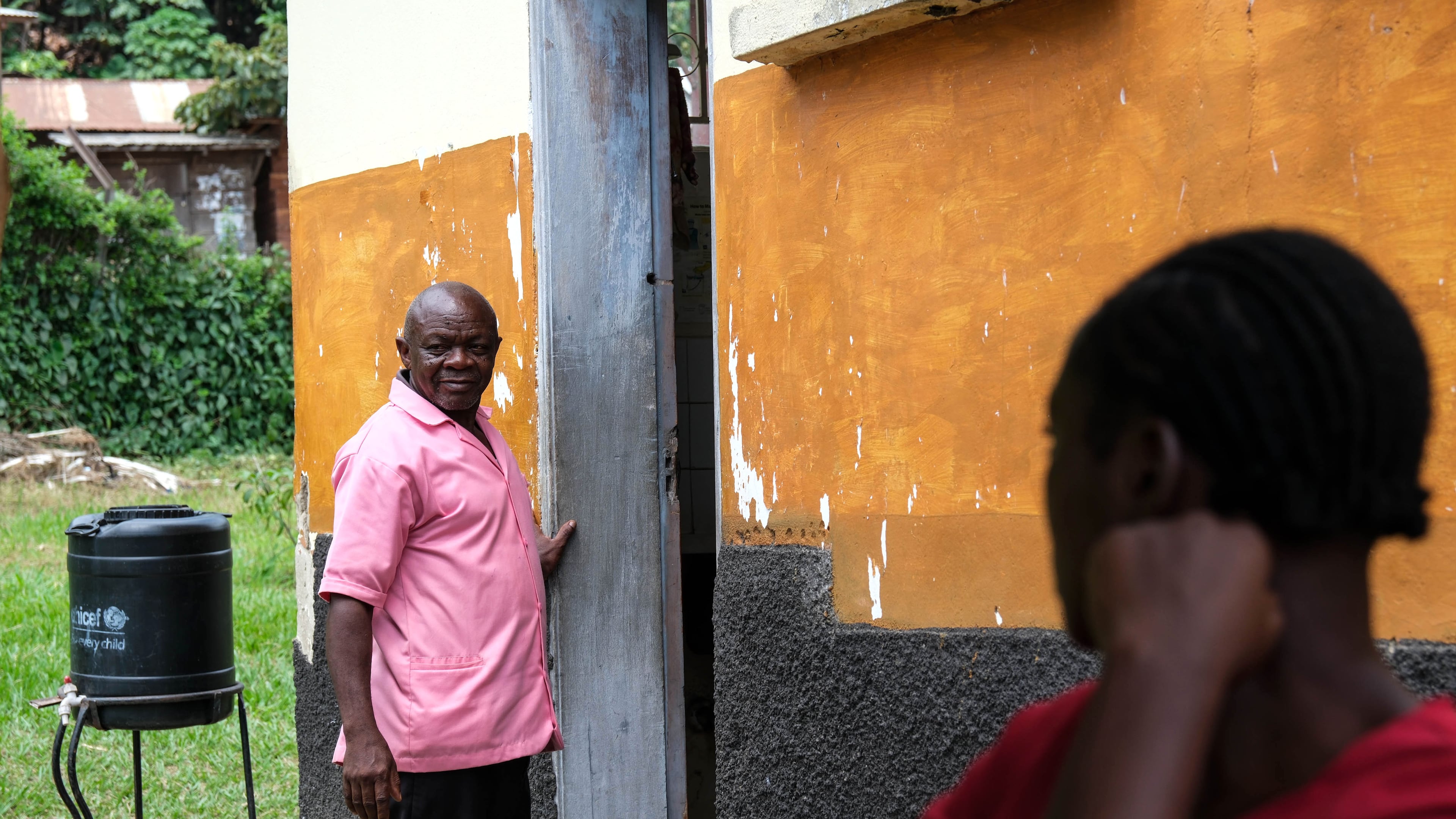 Samuel Kuule, a nurse and survivor of the first Ebola Bundibugyo strain in 2007, stands at Kikyo Health Centre IV in Kikyo Trading village, Bundibugyo District, Uganda, Wednesday, June 3, 2026. (AP Photo/Hajarah Nalwadda)