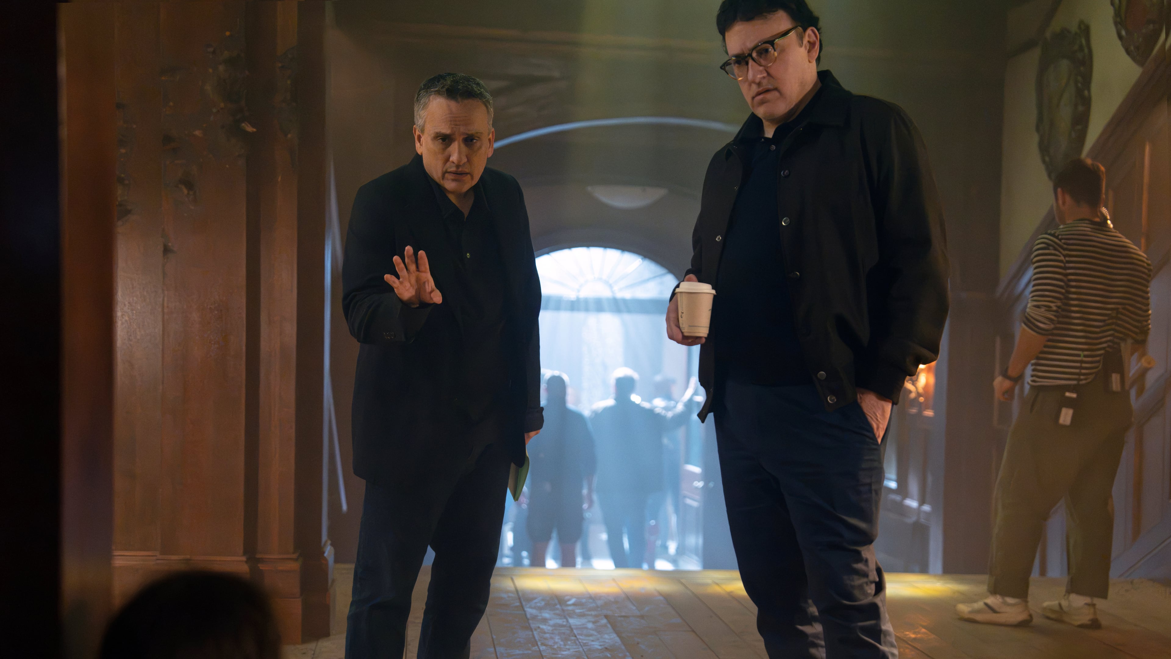 This image released by Marvel shows directors Joe Russo, left, and Anthony Russo on the set of "Avengers: Doomsday." (Paul Abell/Marvel-Disney via AP)