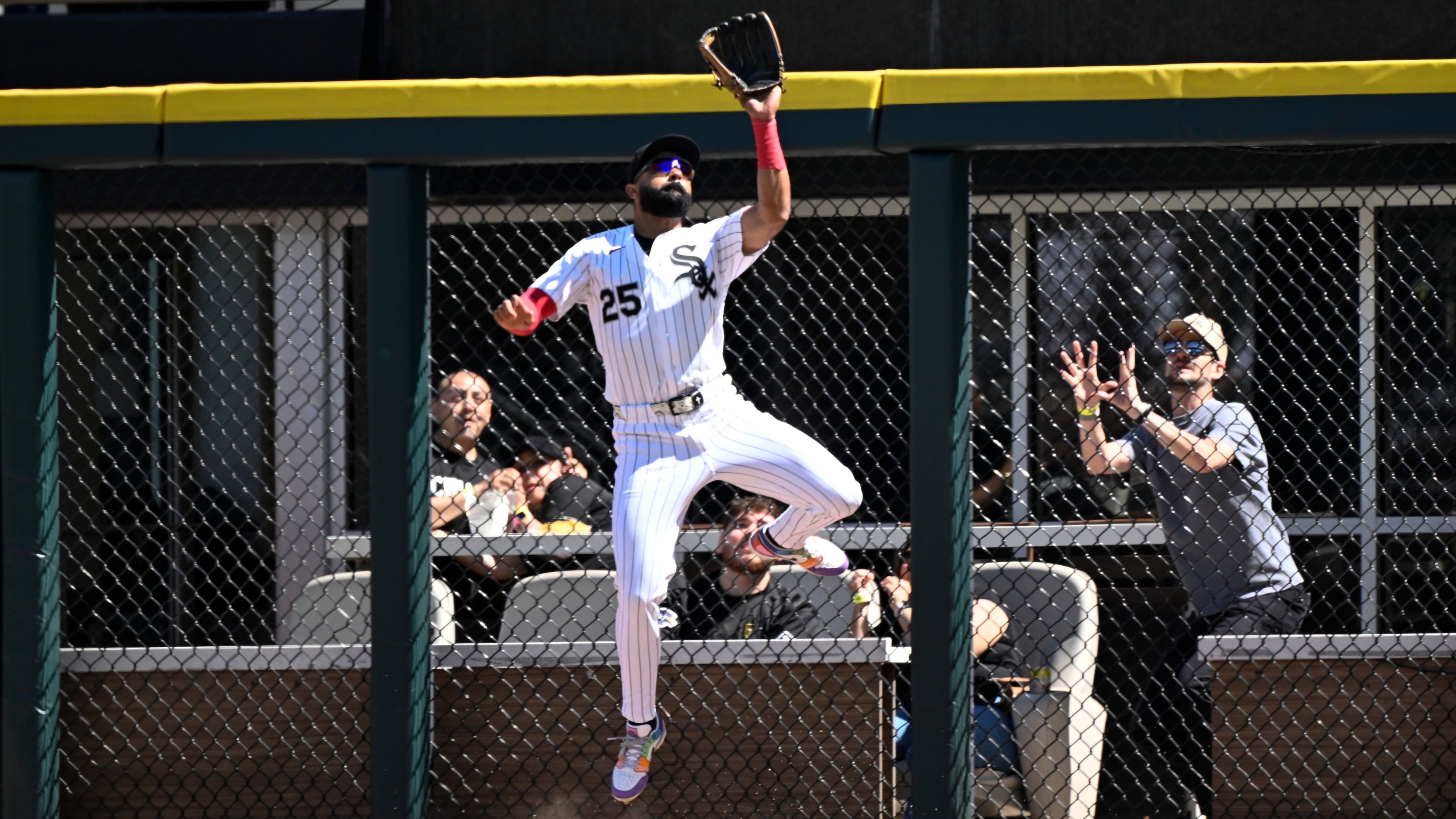 Chicago White Sox right fielder Derek Hill (25) catches a fly ball hit by Minnesota Twins' Tristan Gray during the seventh inning of a baseball game, Thursday, May 28, 2026, in Chicago. (AP Photo/Matt Marton)