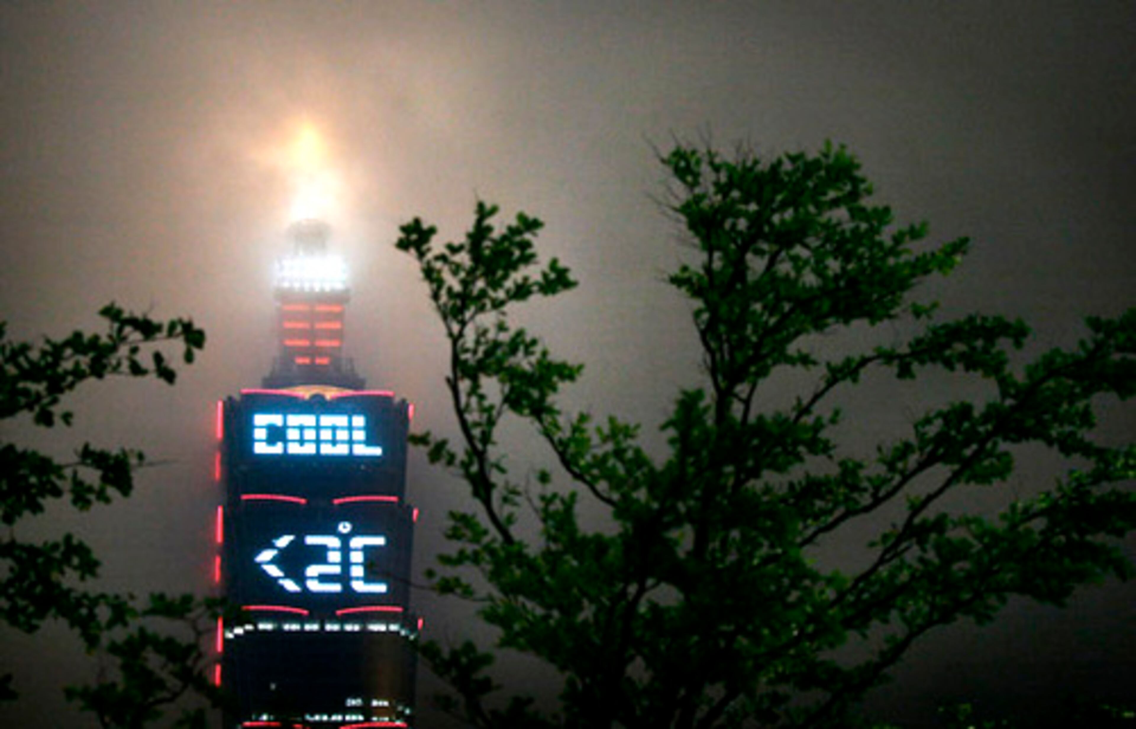 On the eve of the internationally recognized Earth Day, Taipei's city government writes "Cool Below 2 Degrees" celsius (about 28 degrees F) Monday on the side of the Taipei 101 building, to address global warming in Taiwan.